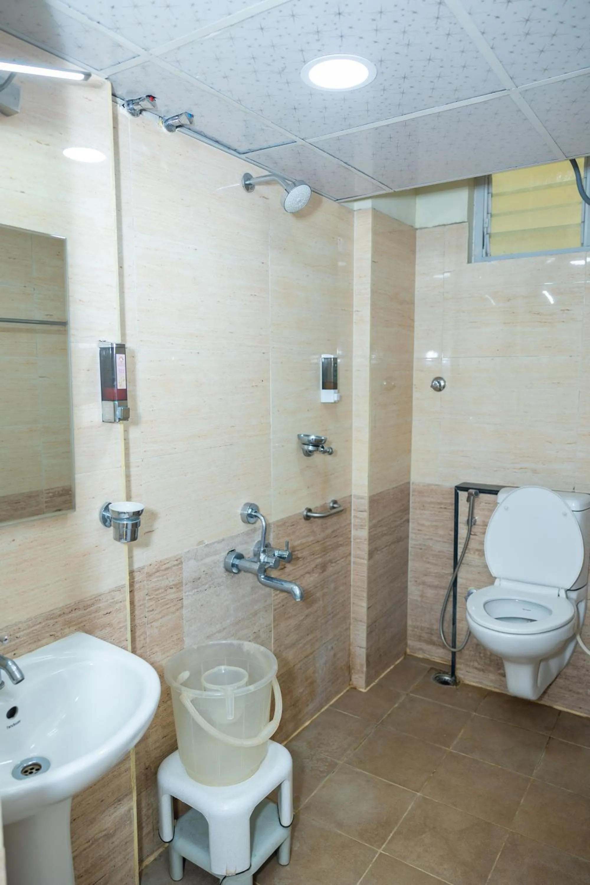Bathroom in Ishwerya Suites