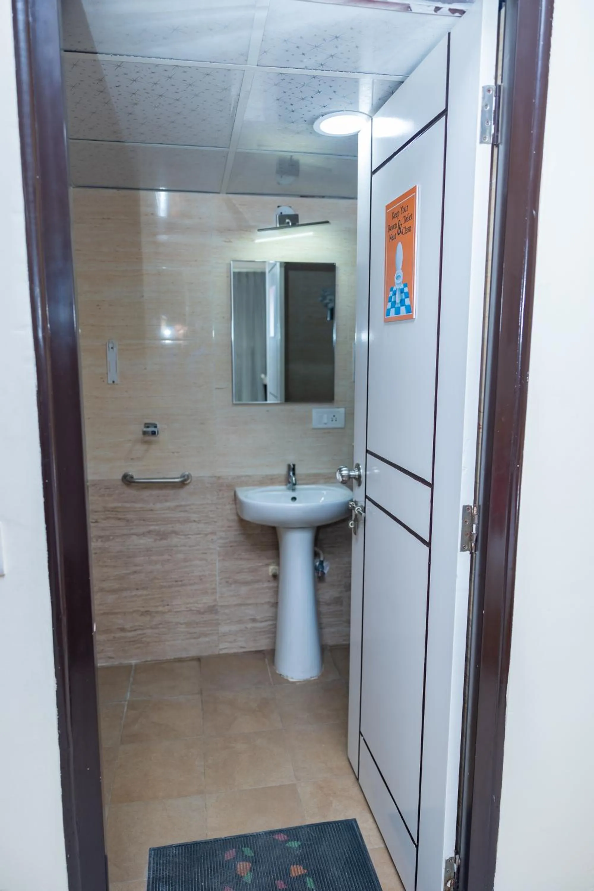 Bathroom in Ishwerya Suites