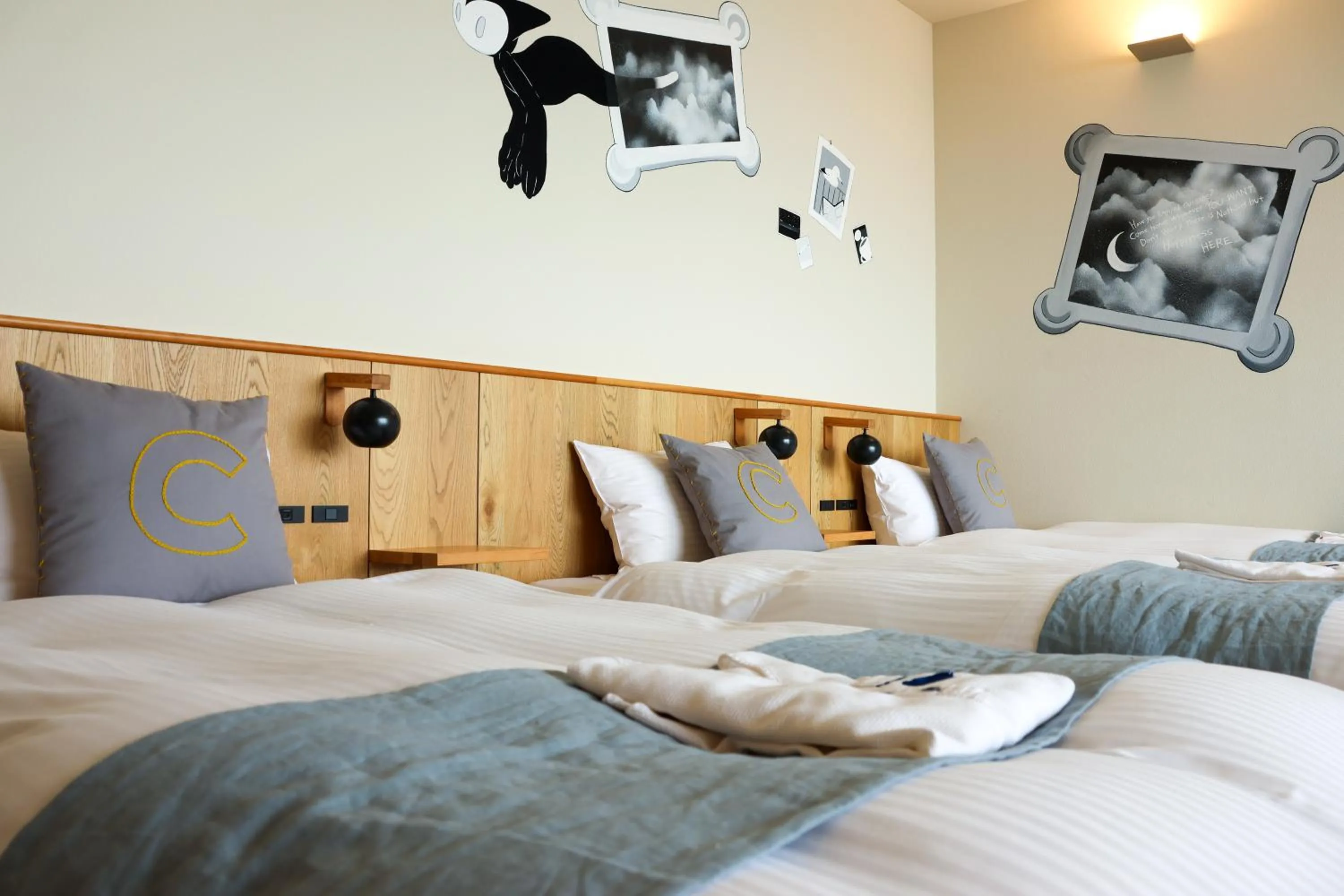 Bed in KAMOME SLOW HOTEL the COMPACT