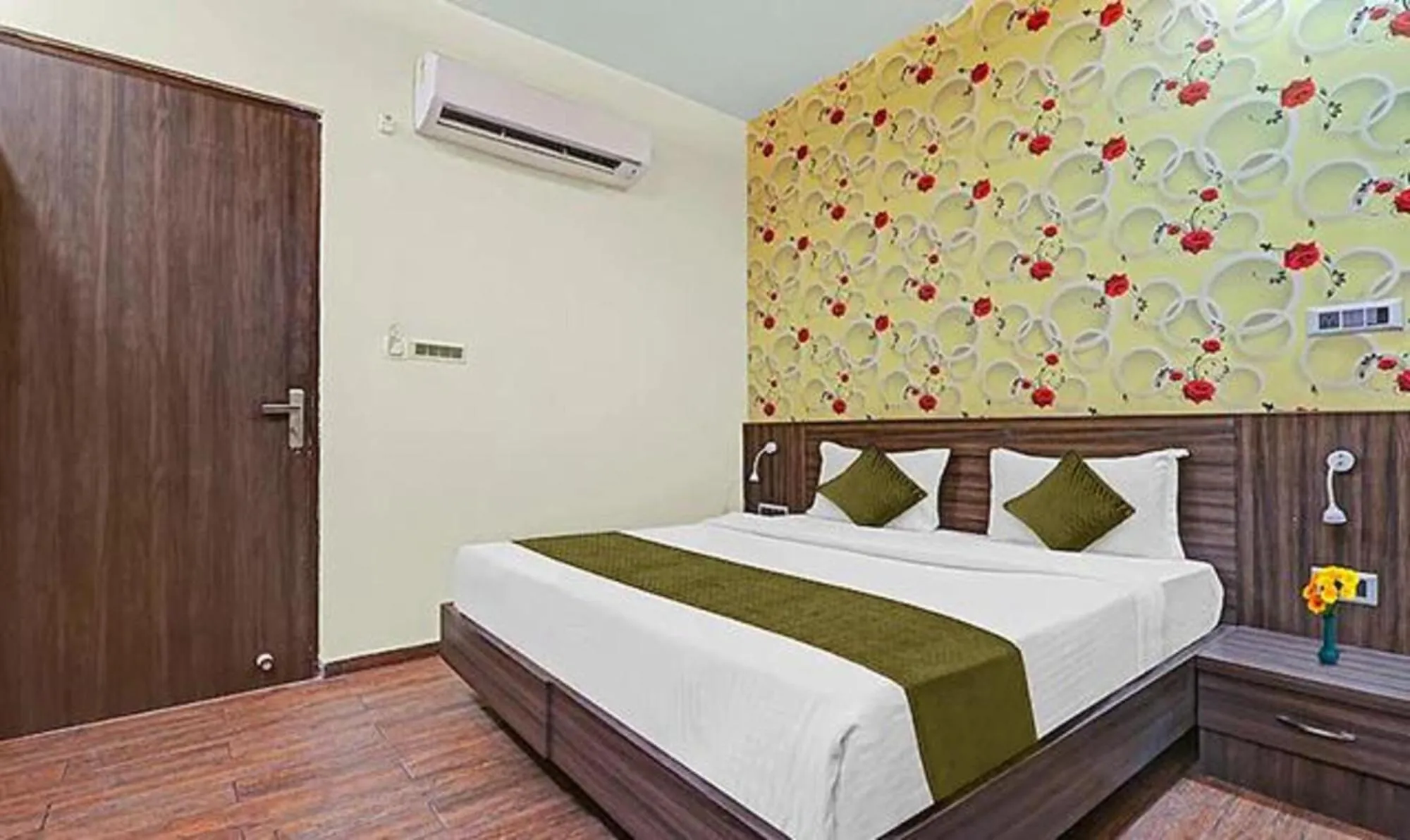 Bed in FabHotel Sam Inn