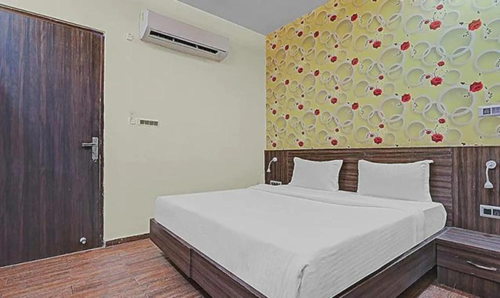 Bed in FabHotel Sam Inn