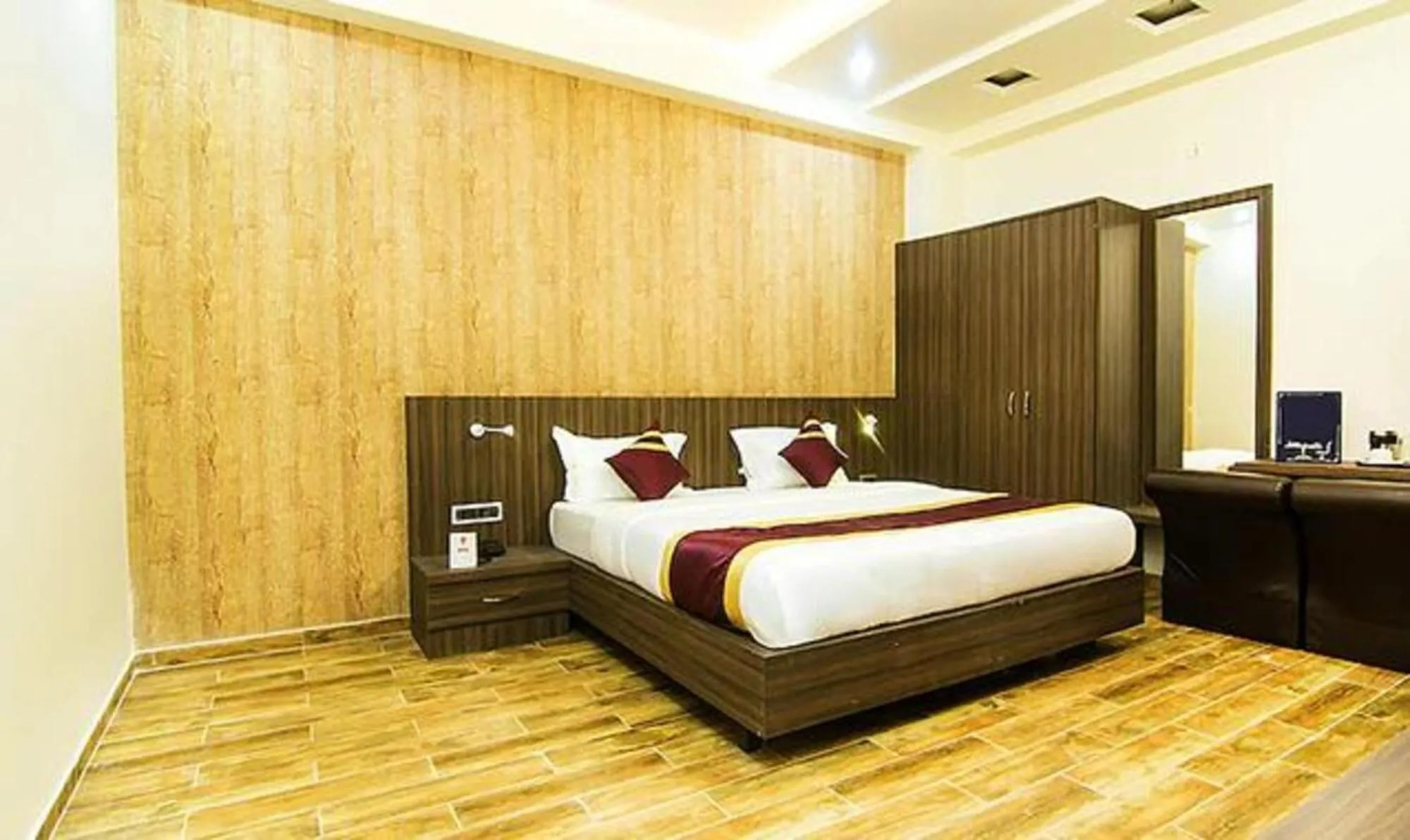 Bed in FabHotel Sam Inn