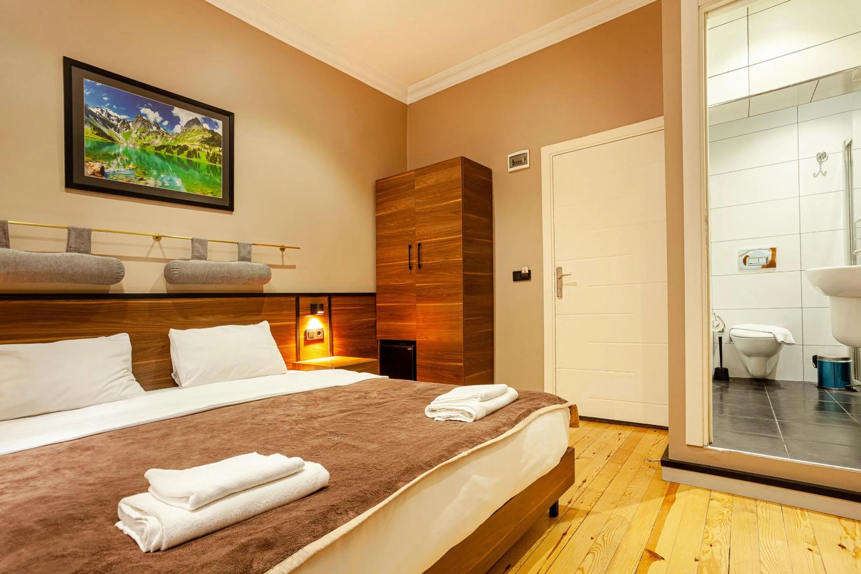 Bed in Aram Kerasi Rooms