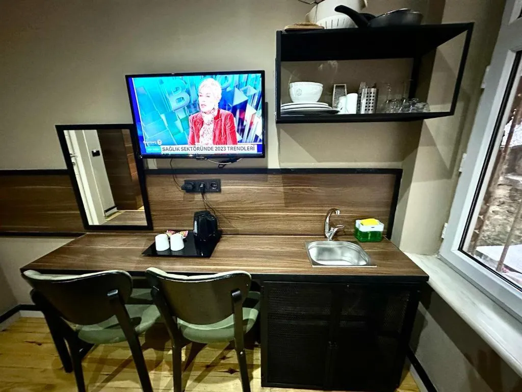 Kitchen or kitchenette in Aram Kerasi Rooms