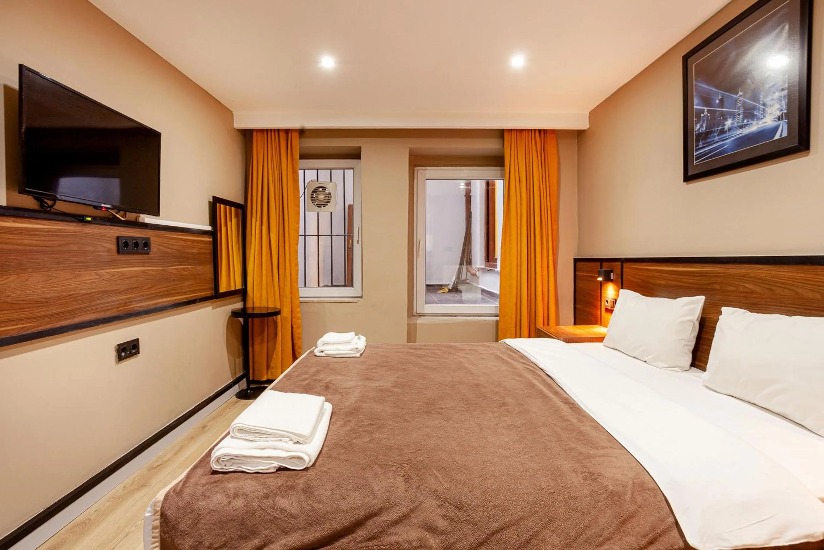 Bed in Aram Kerasi Rooms