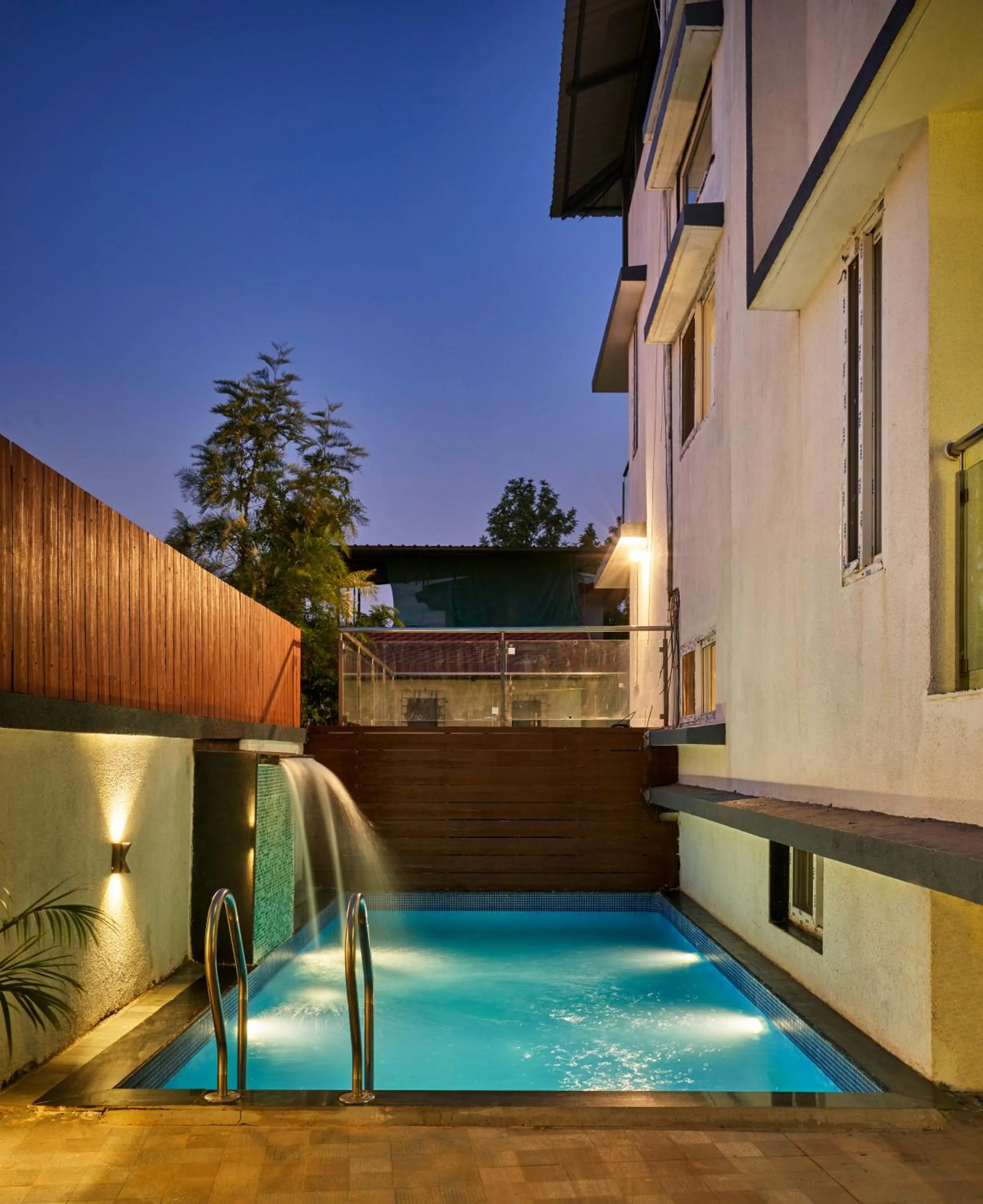 Patio in Drizzle Resort with Swimming pool Near Maapro Garden