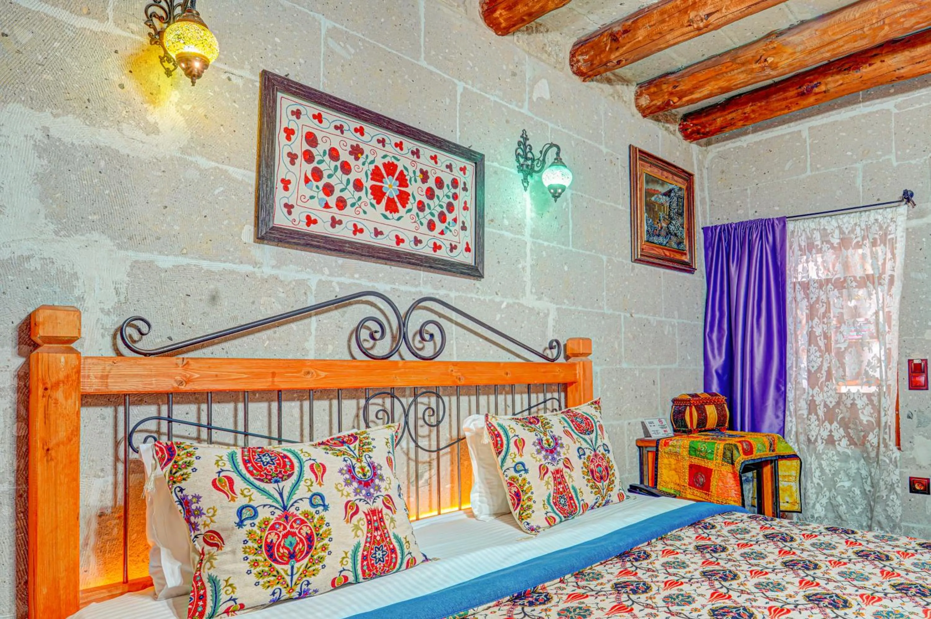 Bed in Atax Cave House