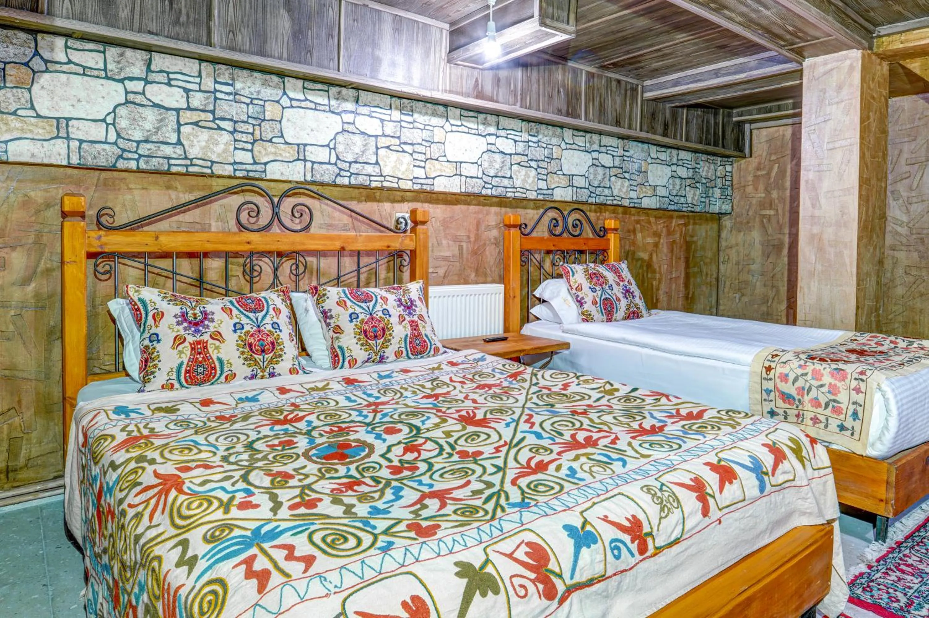 Bed in Atax Cave House