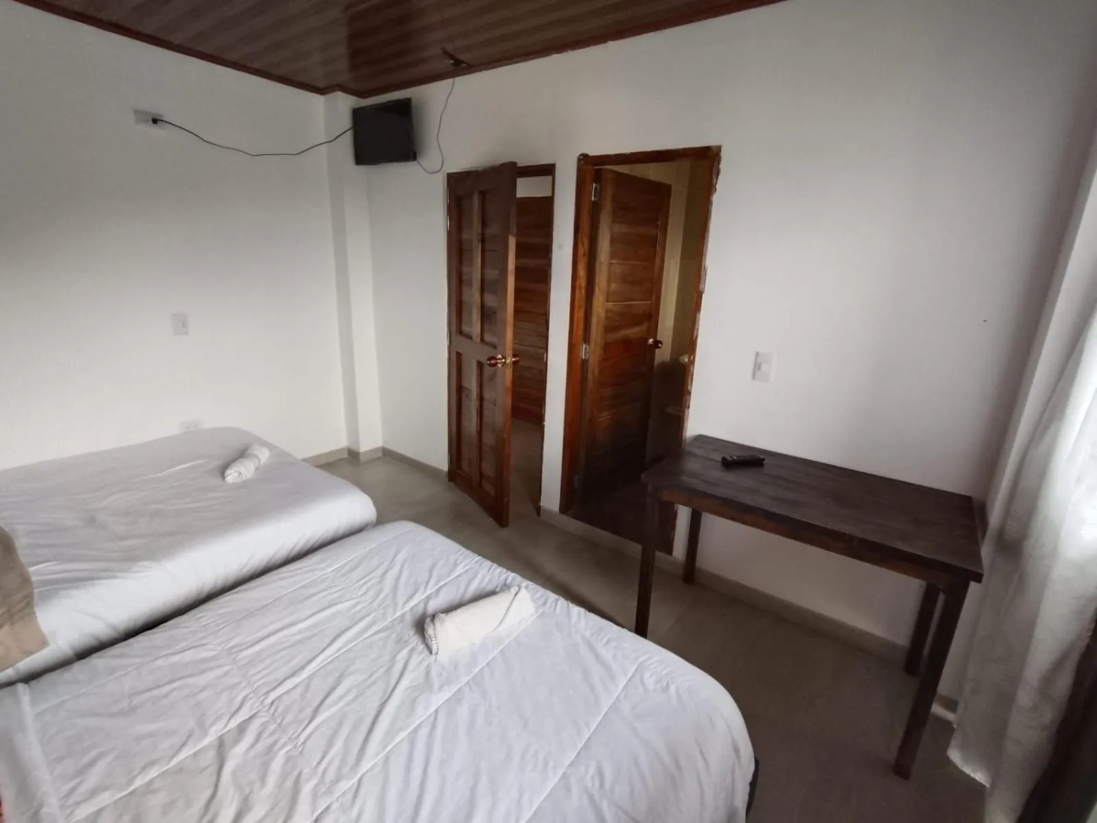 Bed in HOTEL TOTA ELISEO PLAYA BLANCA LAGO DE TOTA