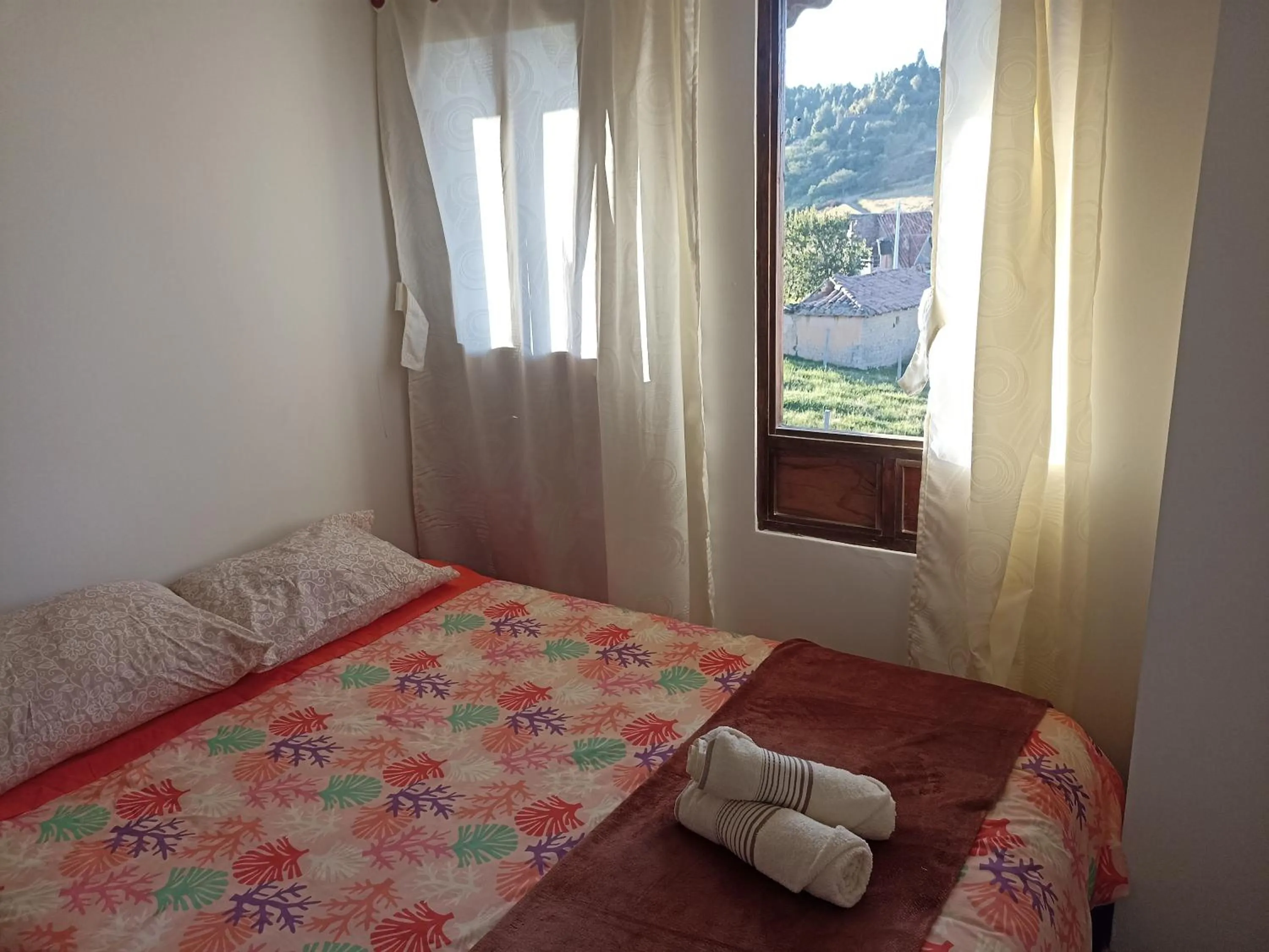 Bed in HOTEL TOTA ELISEO PLAYA BLANCA LAGO DE TOTA