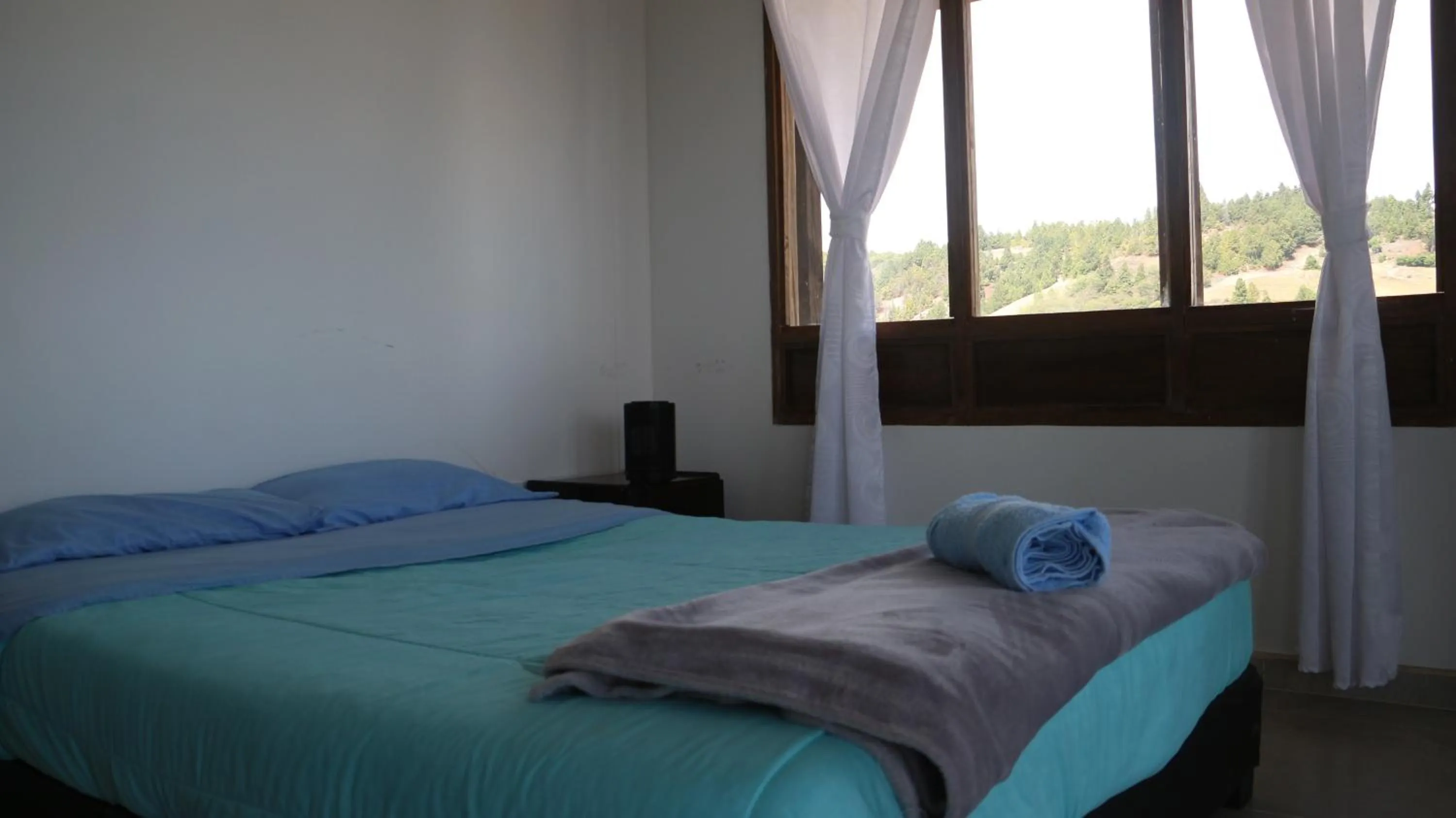 Bed in HOTEL TOTA ELISEO PLAYA BLANCA LAGO DE TOTA