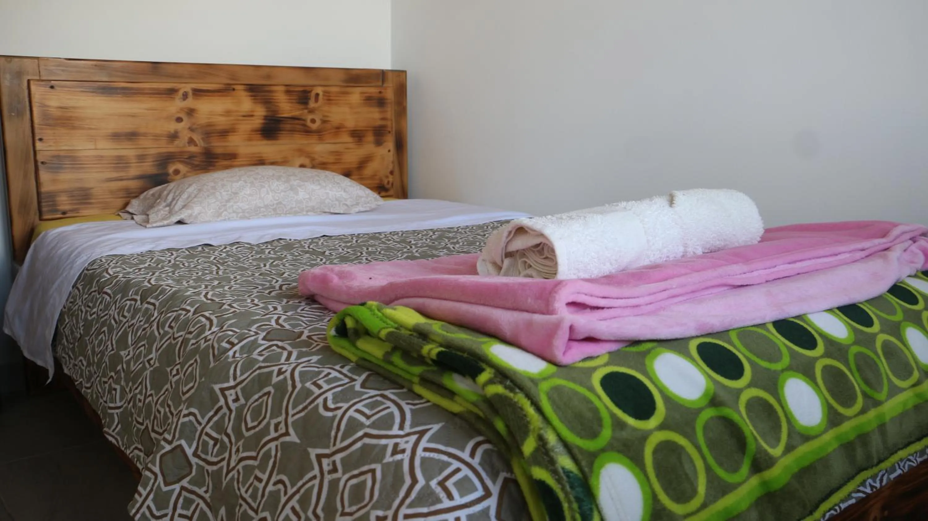 Bed in HOTEL TOTA ELISEO PLAYA BLANCA LAGO DE TOTA