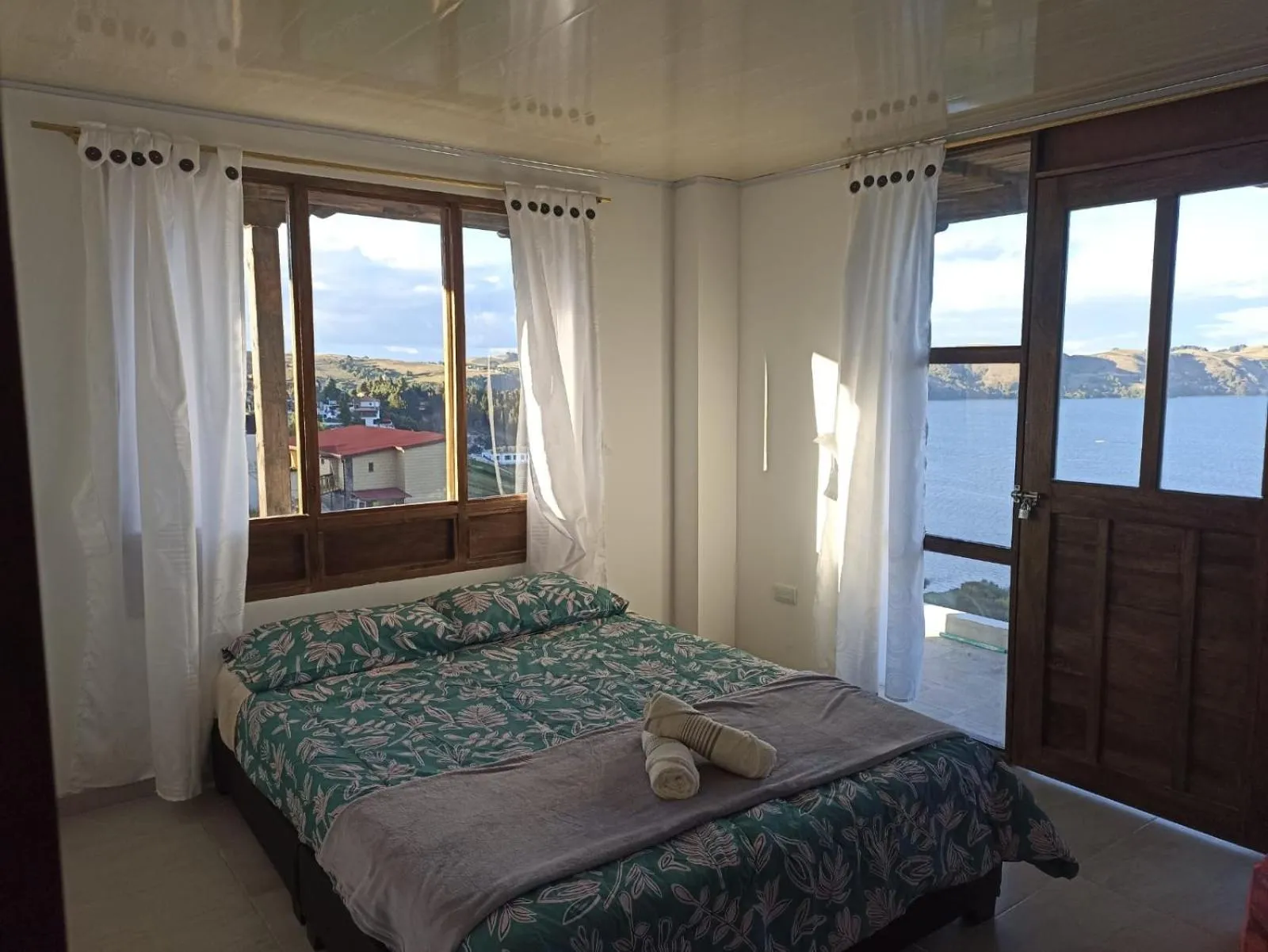 Bed in HOTEL TOTA ELISEO PLAYA BLANCA LAGO DE TOTA