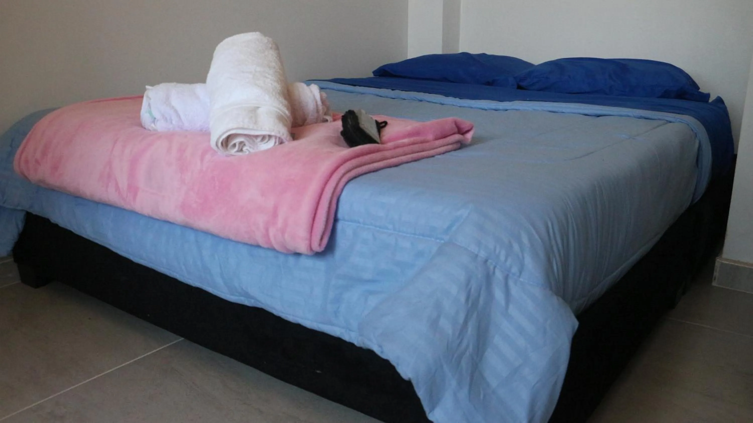 Bed in HOTEL TOTA ELISEO PLAYA BLANCA LAGO DE TOTA