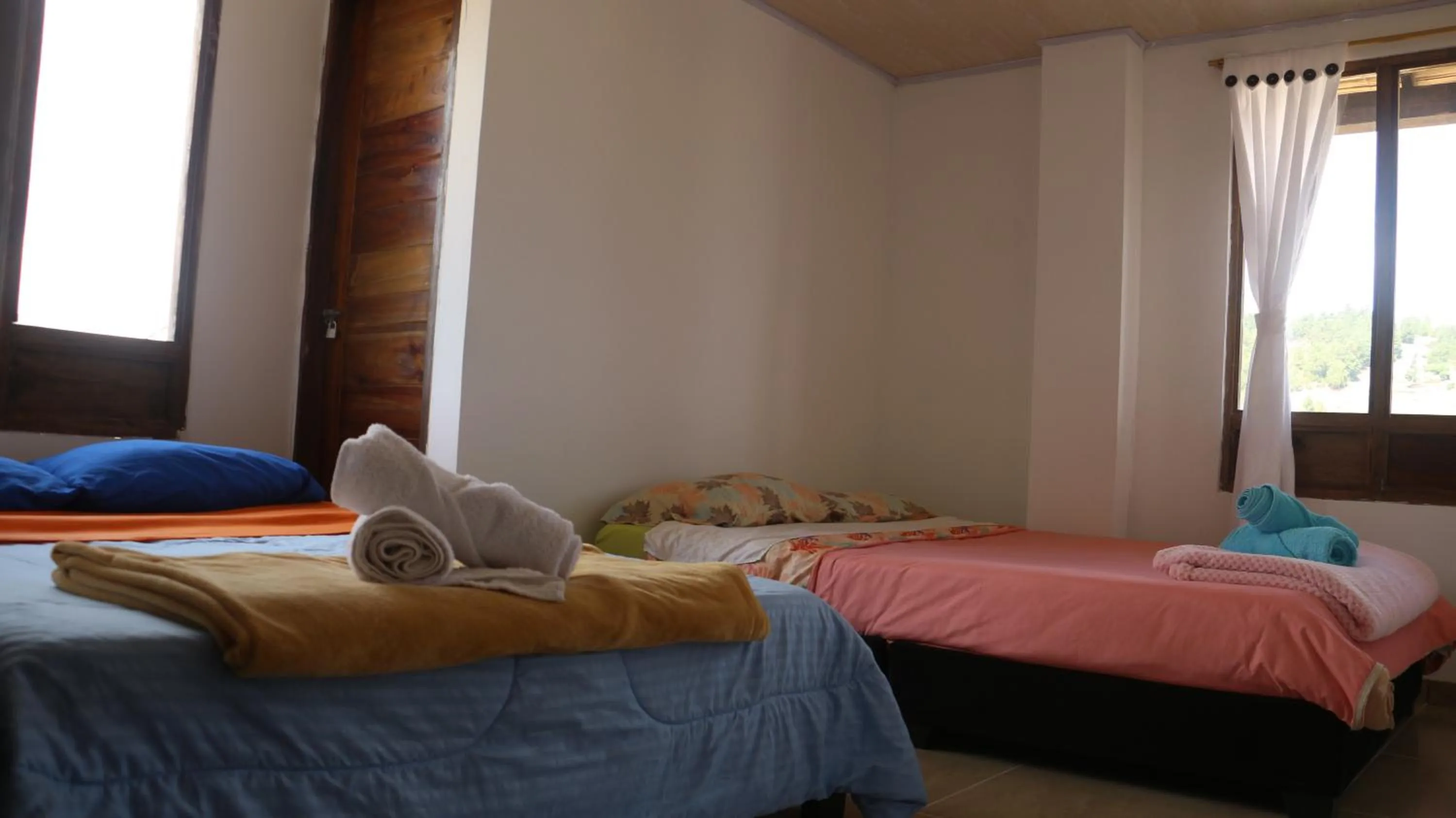 Bed in HOTEL TOTA ELISEO PLAYA BLANCA LAGO DE TOTA