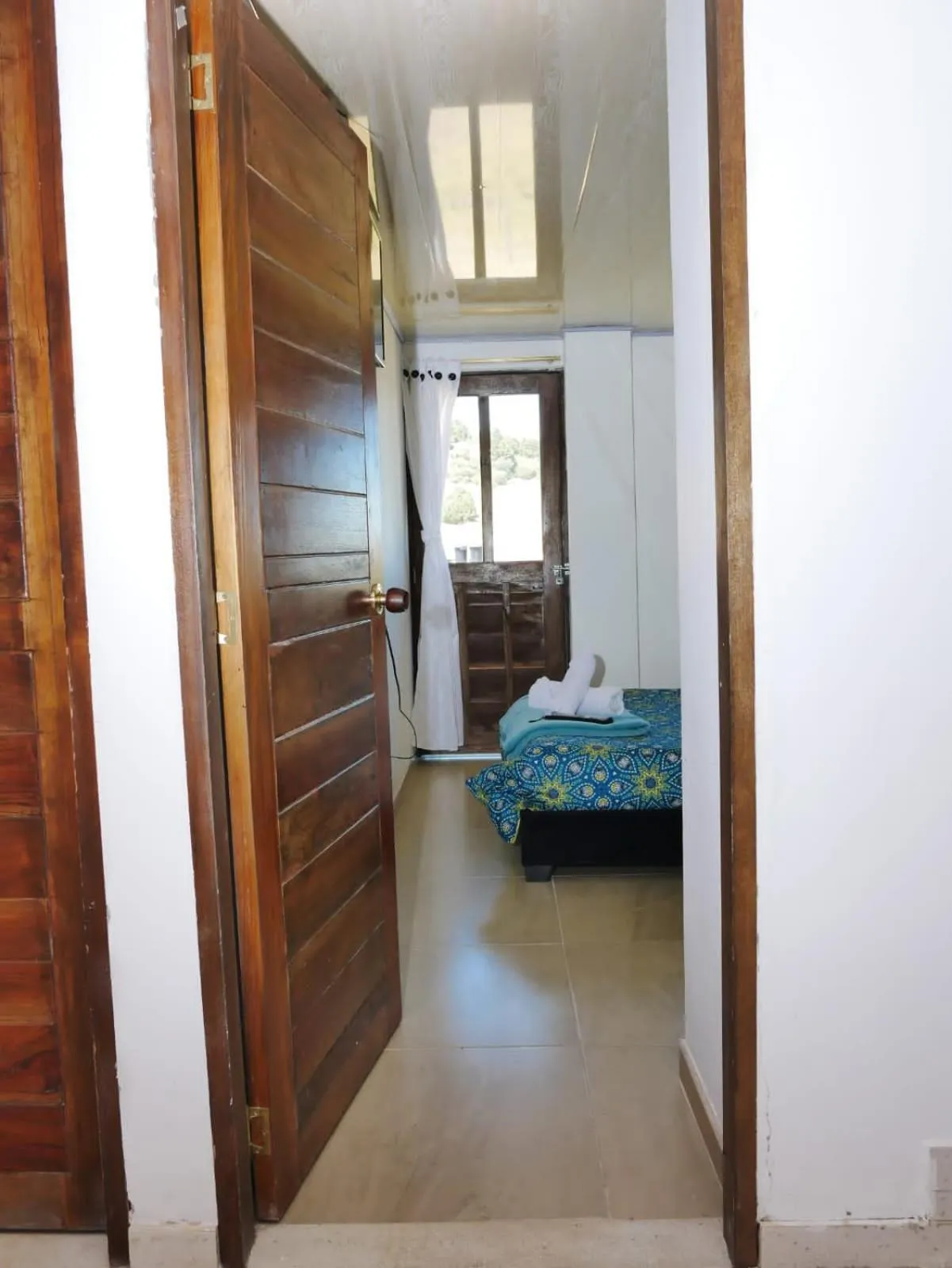 Bed in HOTEL TOTA ELISEO PLAYA BLANCA LAGO DE TOTA