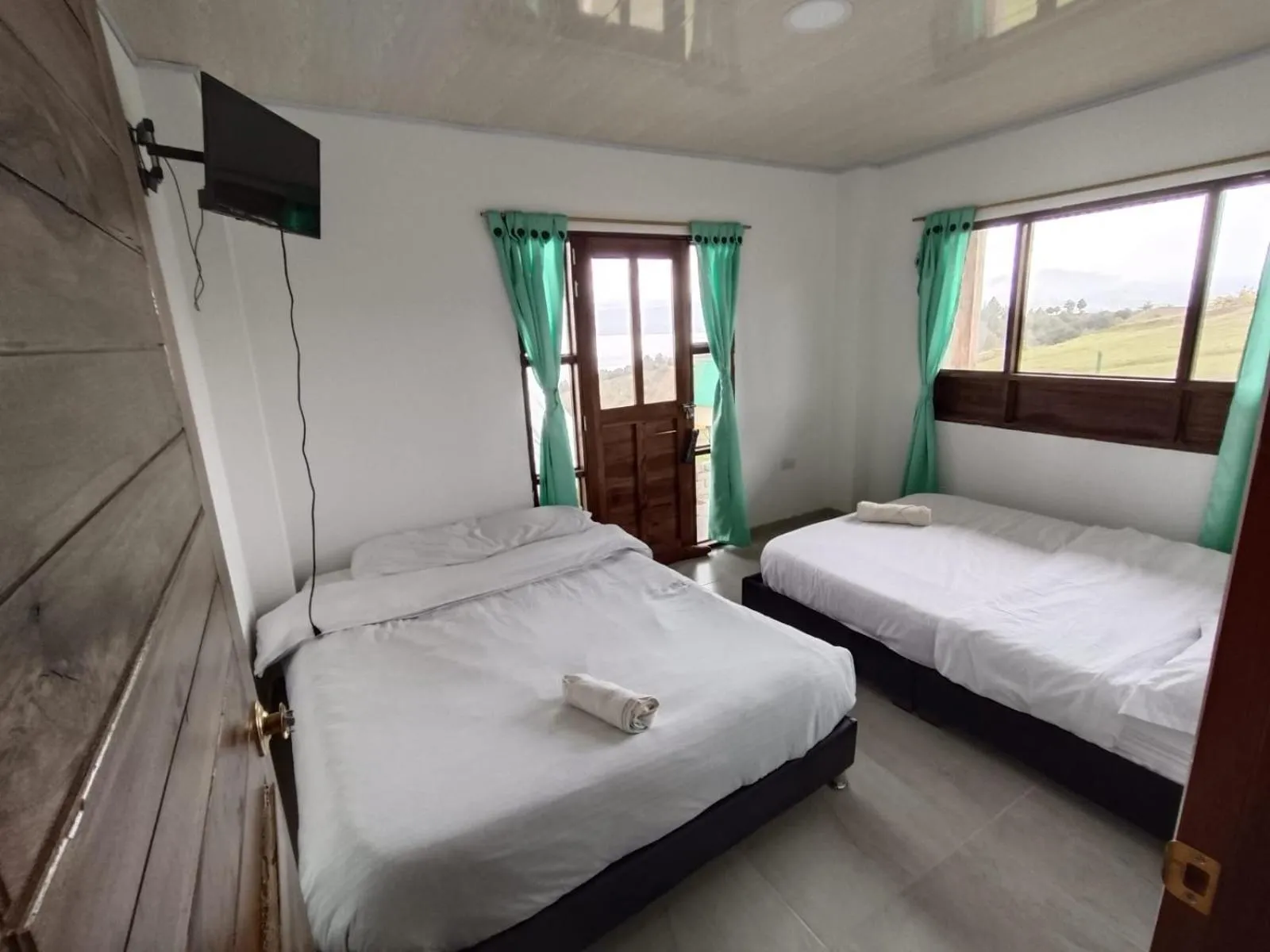 Bed in HOTEL TOTA ELISEO PLAYA BLANCA LAGO DE TOTA