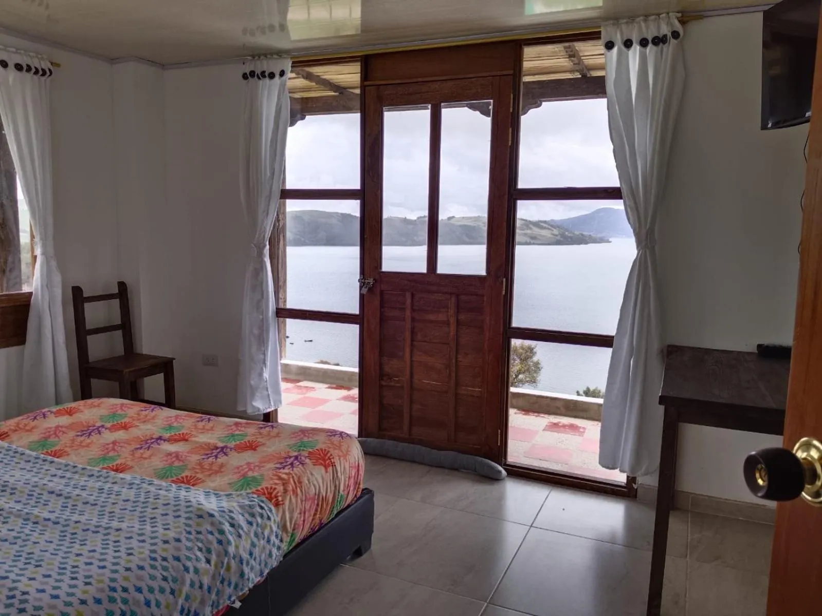 Bed in HOTEL TOTA ELISEO PLAYA BLANCA LAGO DE TOTA