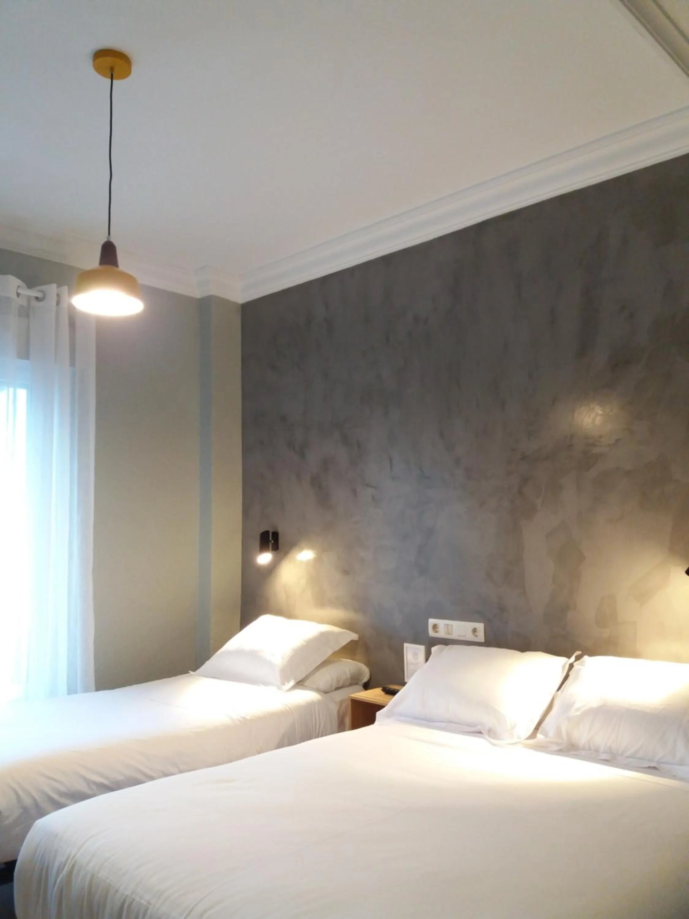 Photo of the whole room, Bed in Pensión Don Claudio