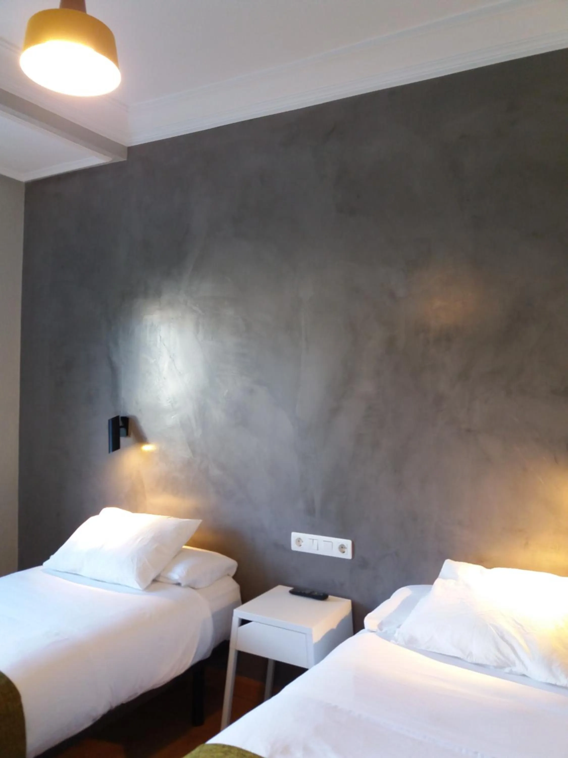 Photo of the whole room, Bed in Pensión Don Claudio