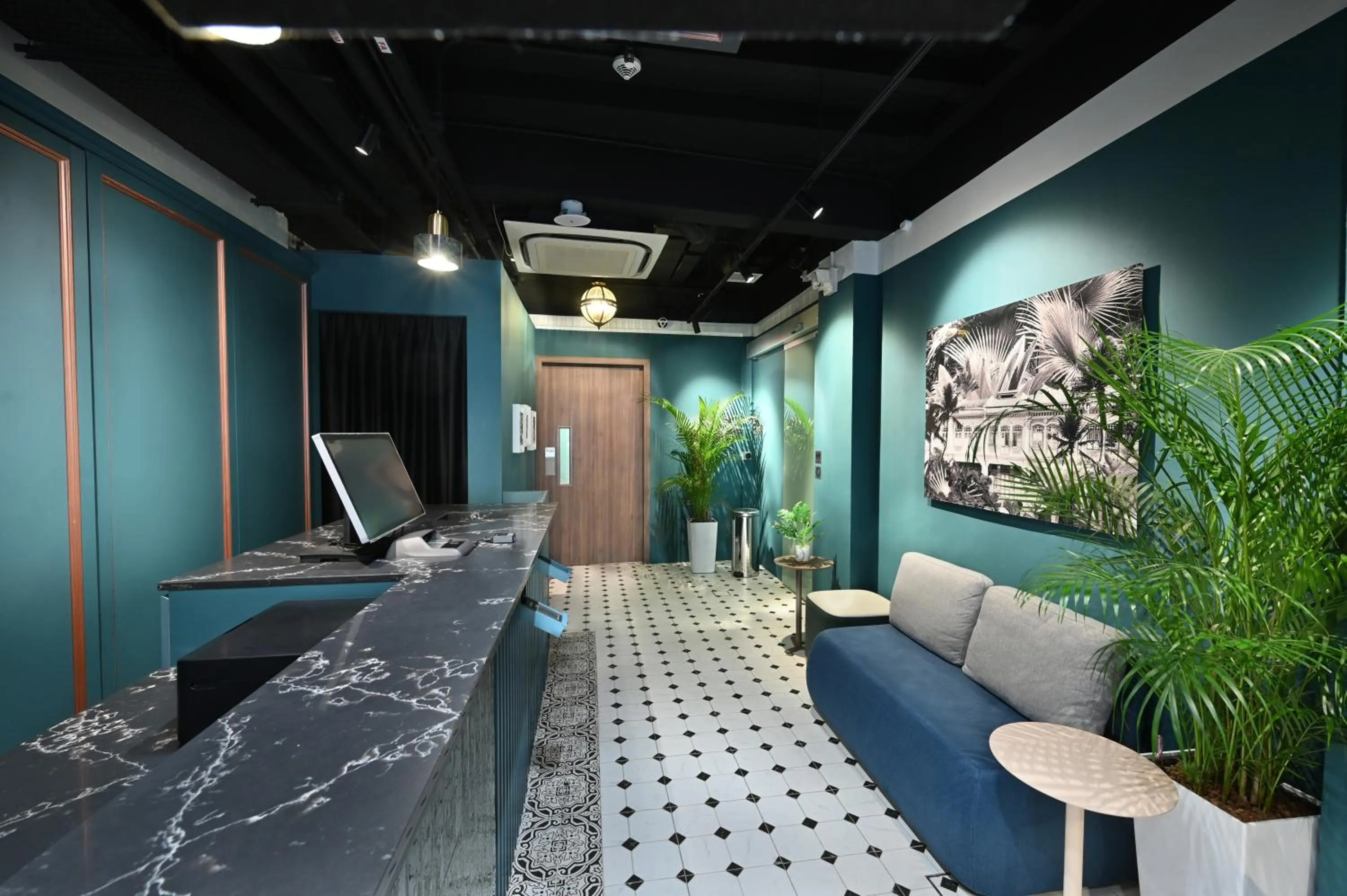 Lobby or reception in Dream Chaser Boutique Capsule Hotel