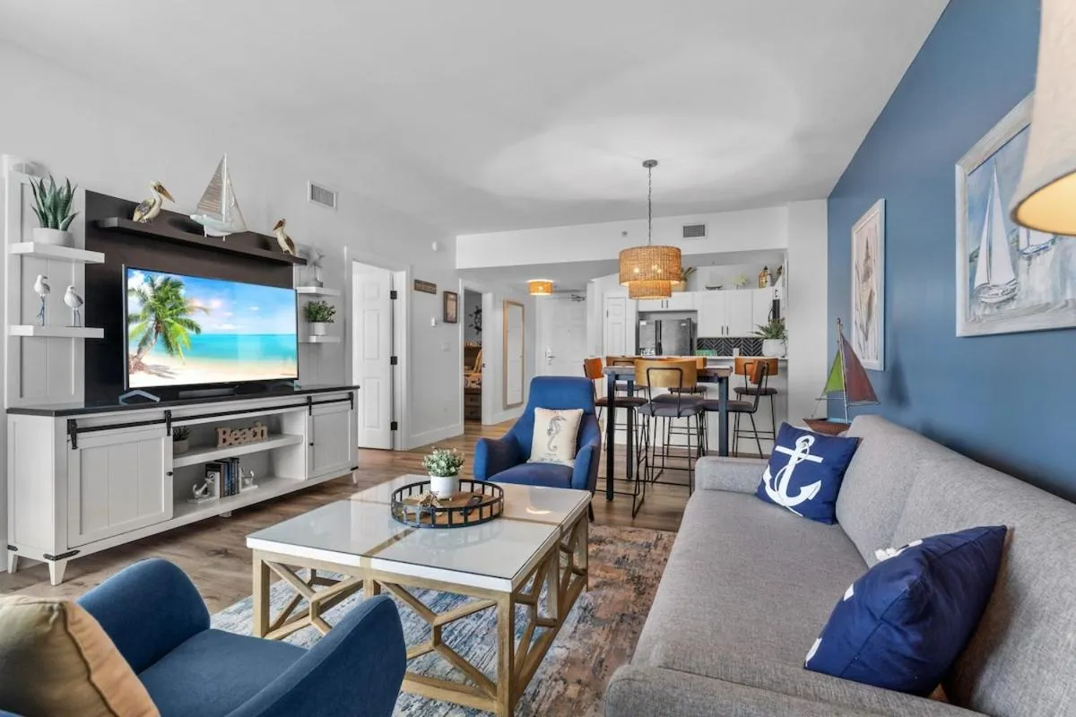 TV and multimedia in Sunrise Surprise 9th floor 2BR 2 BA King Suite Beach shuttle, heated pool!