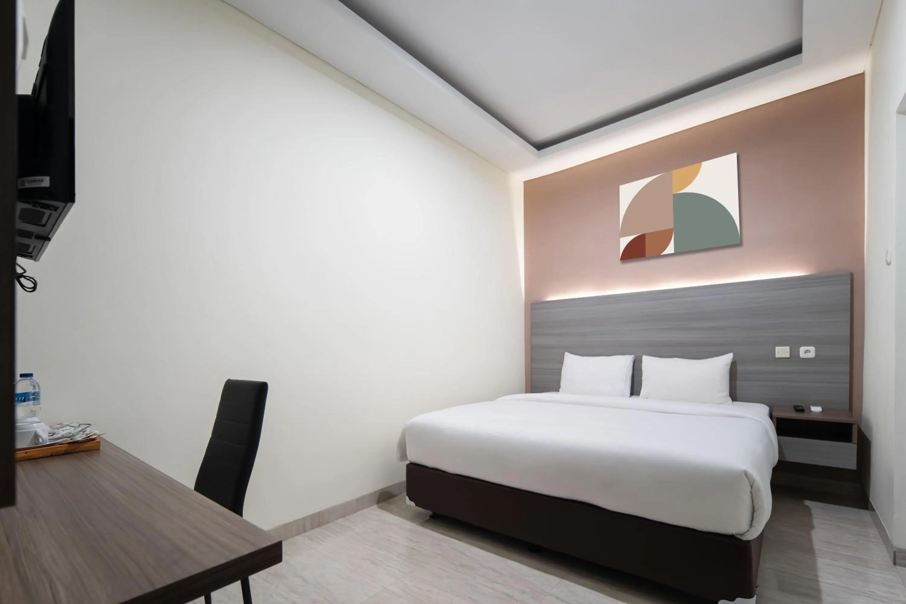 Bed in Cove West Inn Cihampelas