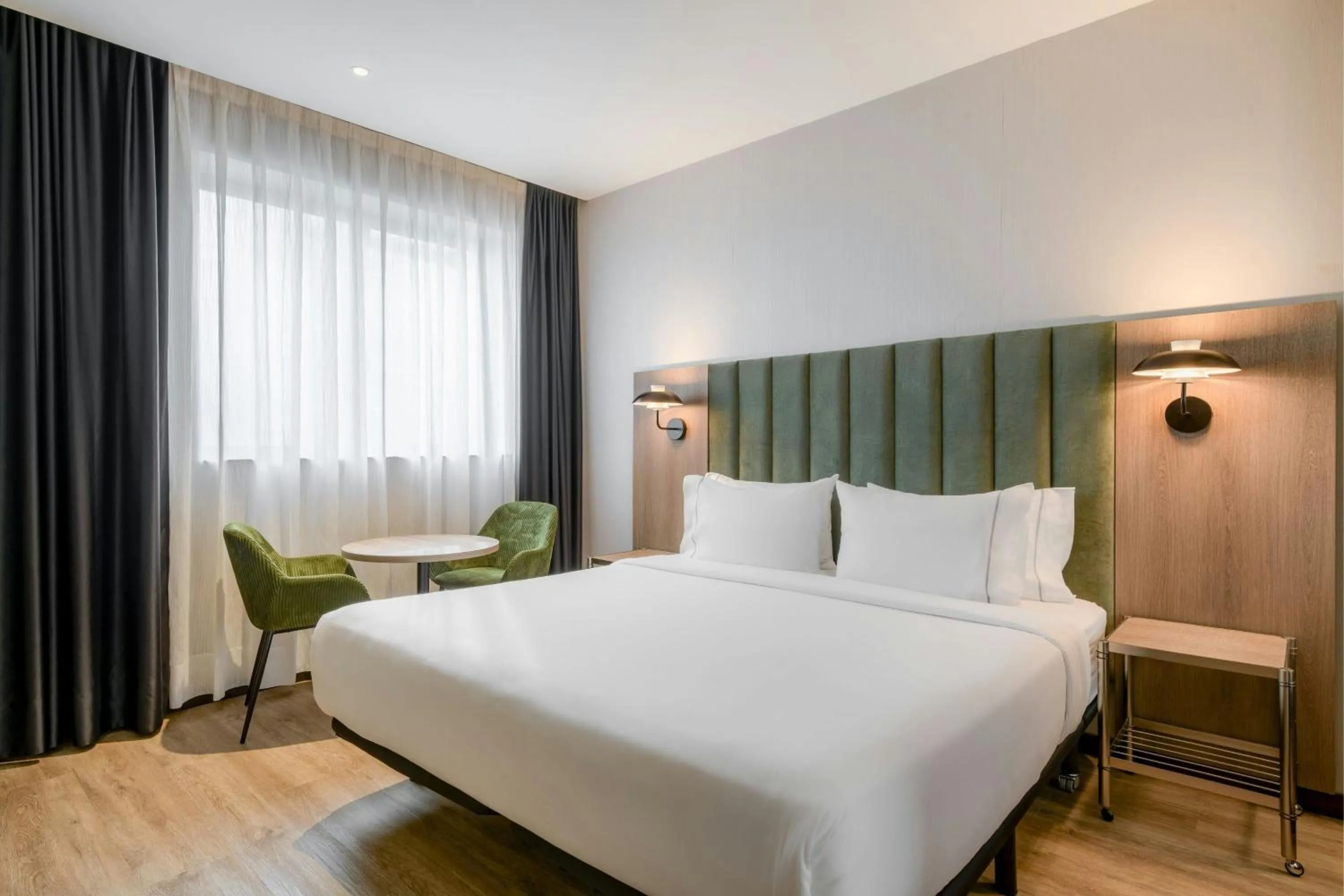 Photo of the whole room, Bed in AC Hotel Madrid Feria by Marriott