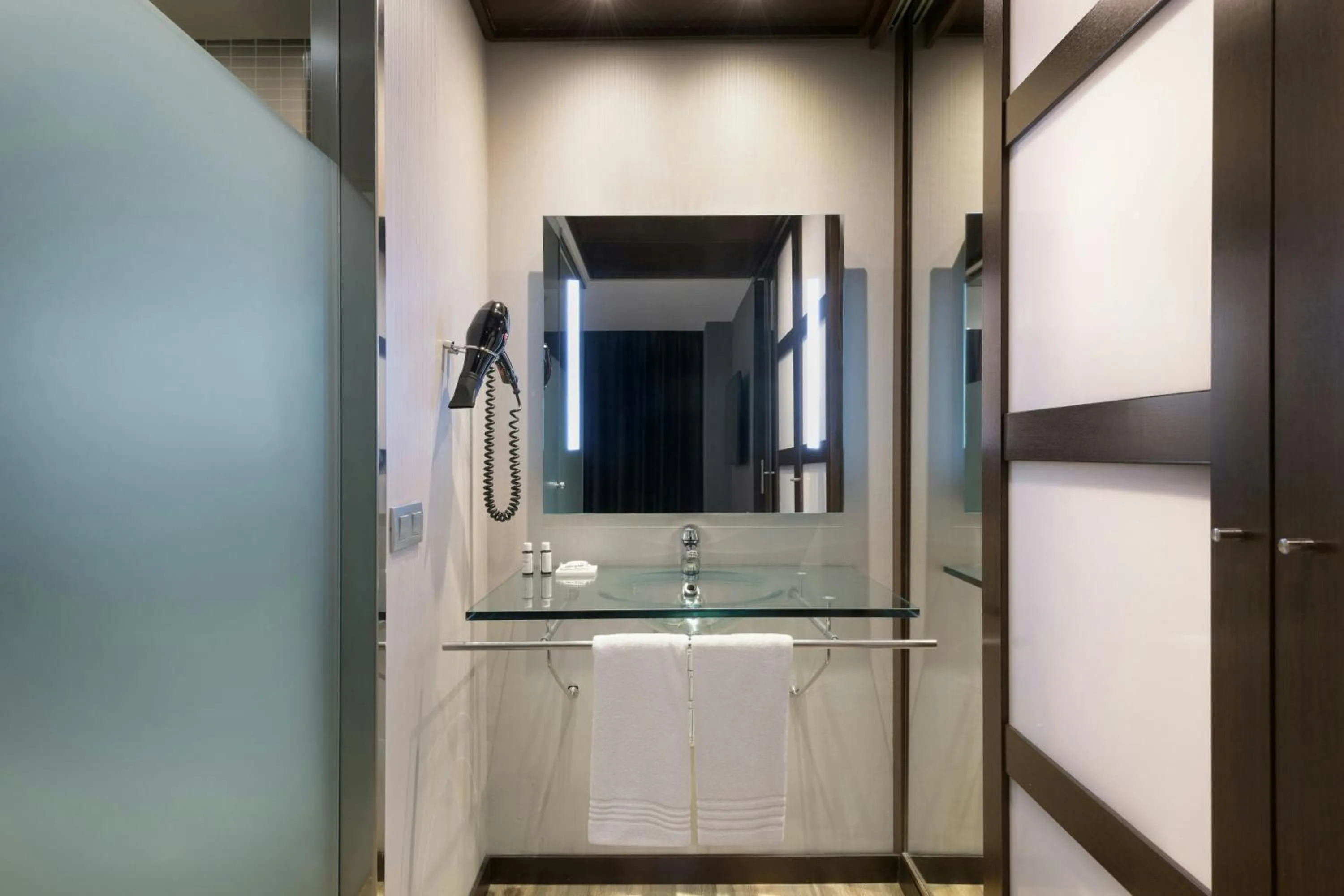 Bathroom in AC Hotel Madrid Feria by Marriott