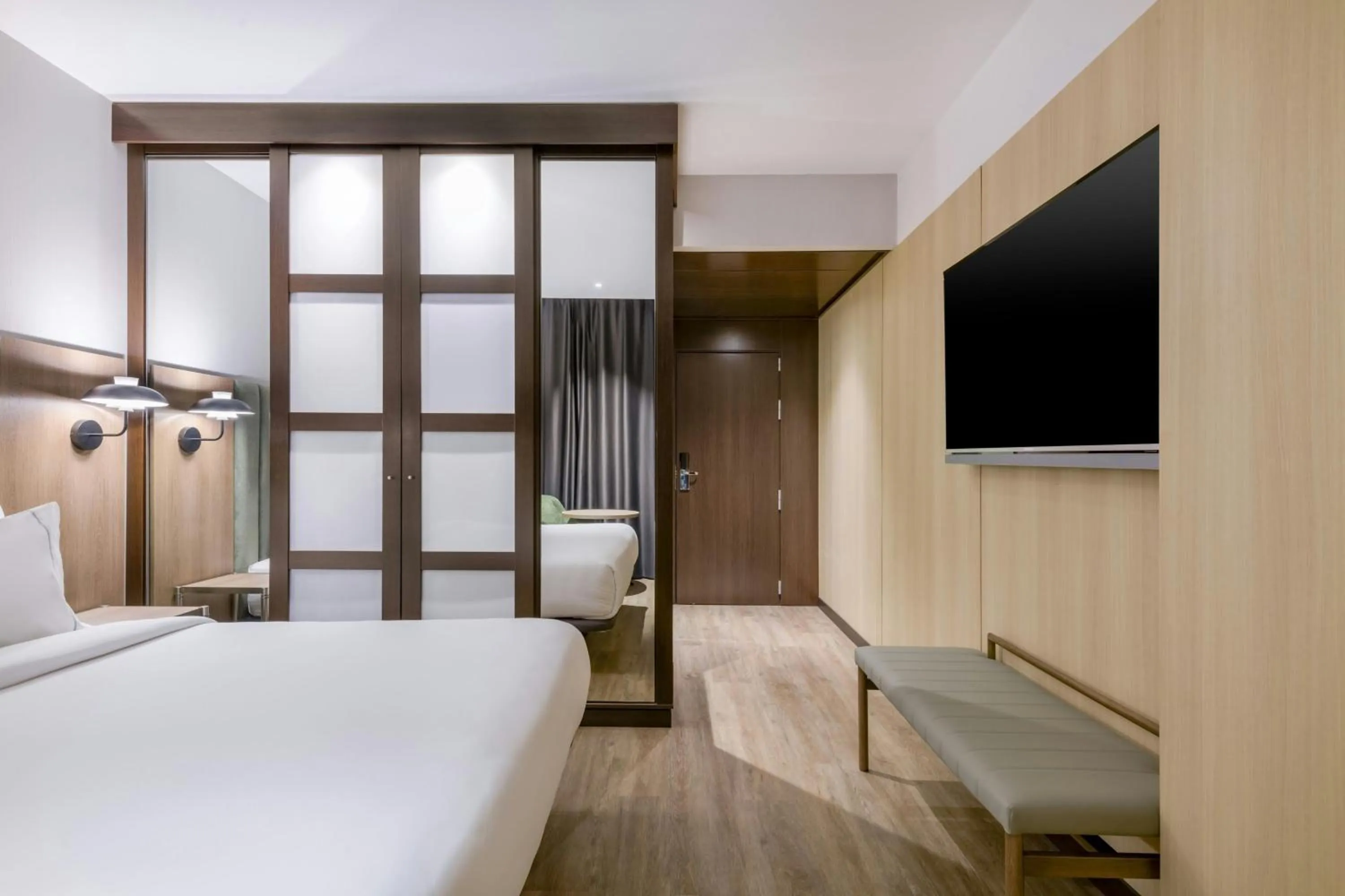 Photo of the whole room, Bed in AC Hotel Madrid Feria by Marriott