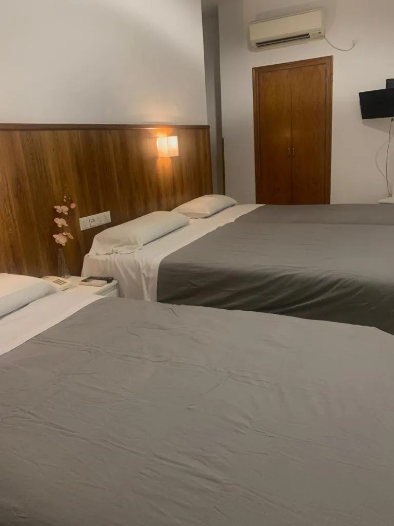 Bed in Hotel Gran Plaza