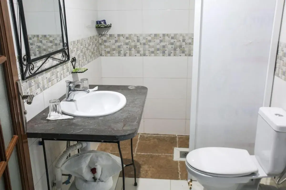 Triple Room - single occupancy in HOTEL LA POMME ZAIDA Triple Room - single occupancy in HOTEL LA POMME ZAIDA