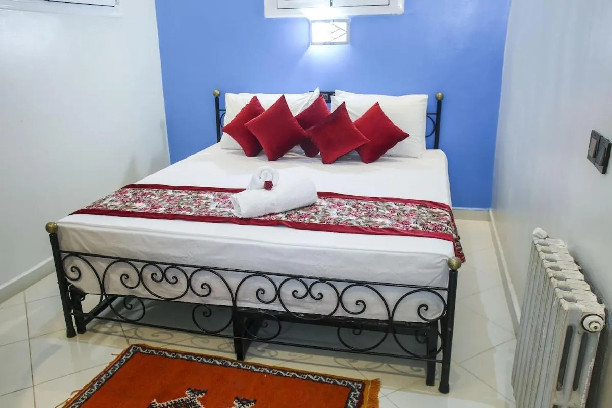 Bed in HOTEL LA POMME ZAIDA