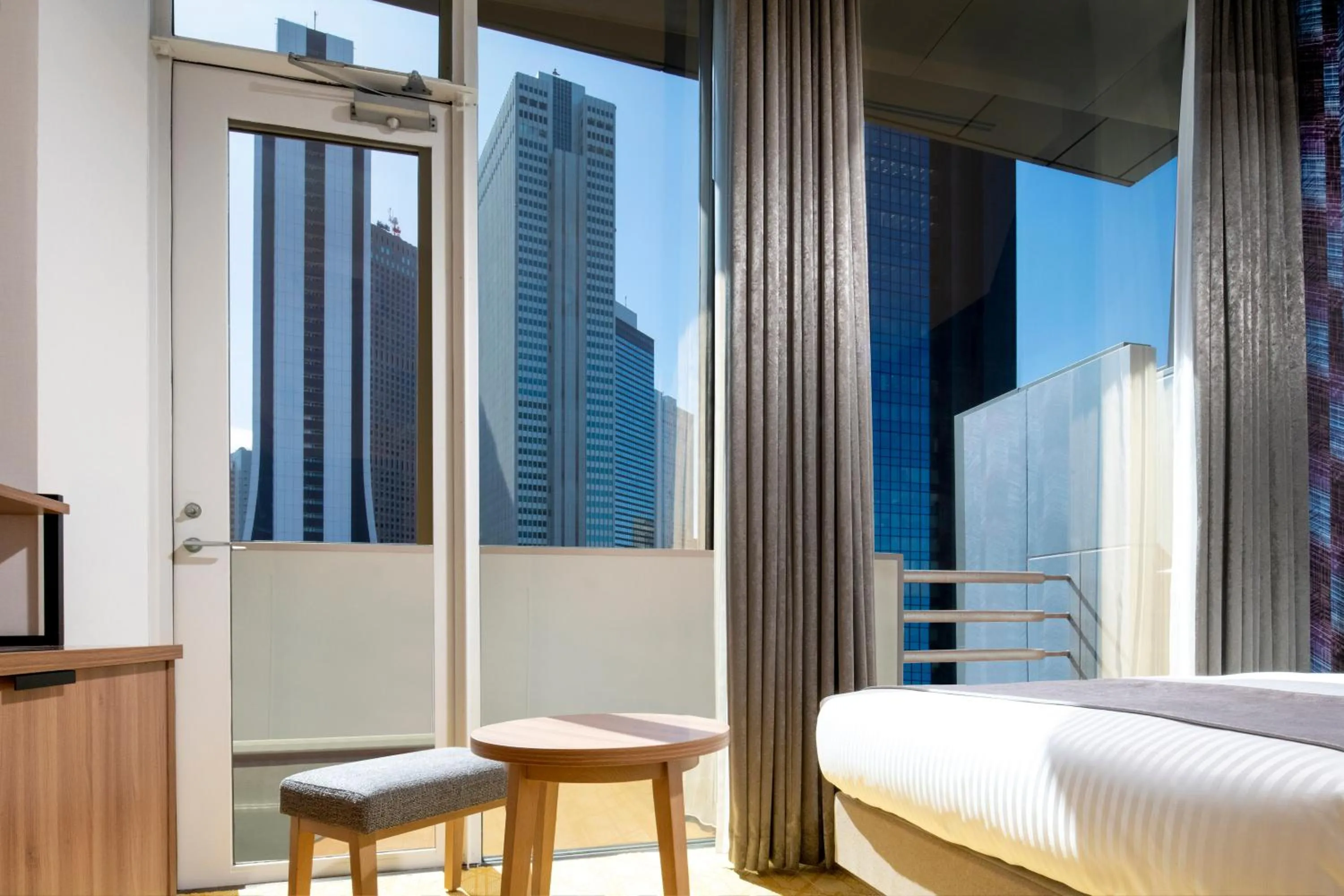 View (from property/room), Bed in HOTEL MYSTAYS Nishi Shinjuku