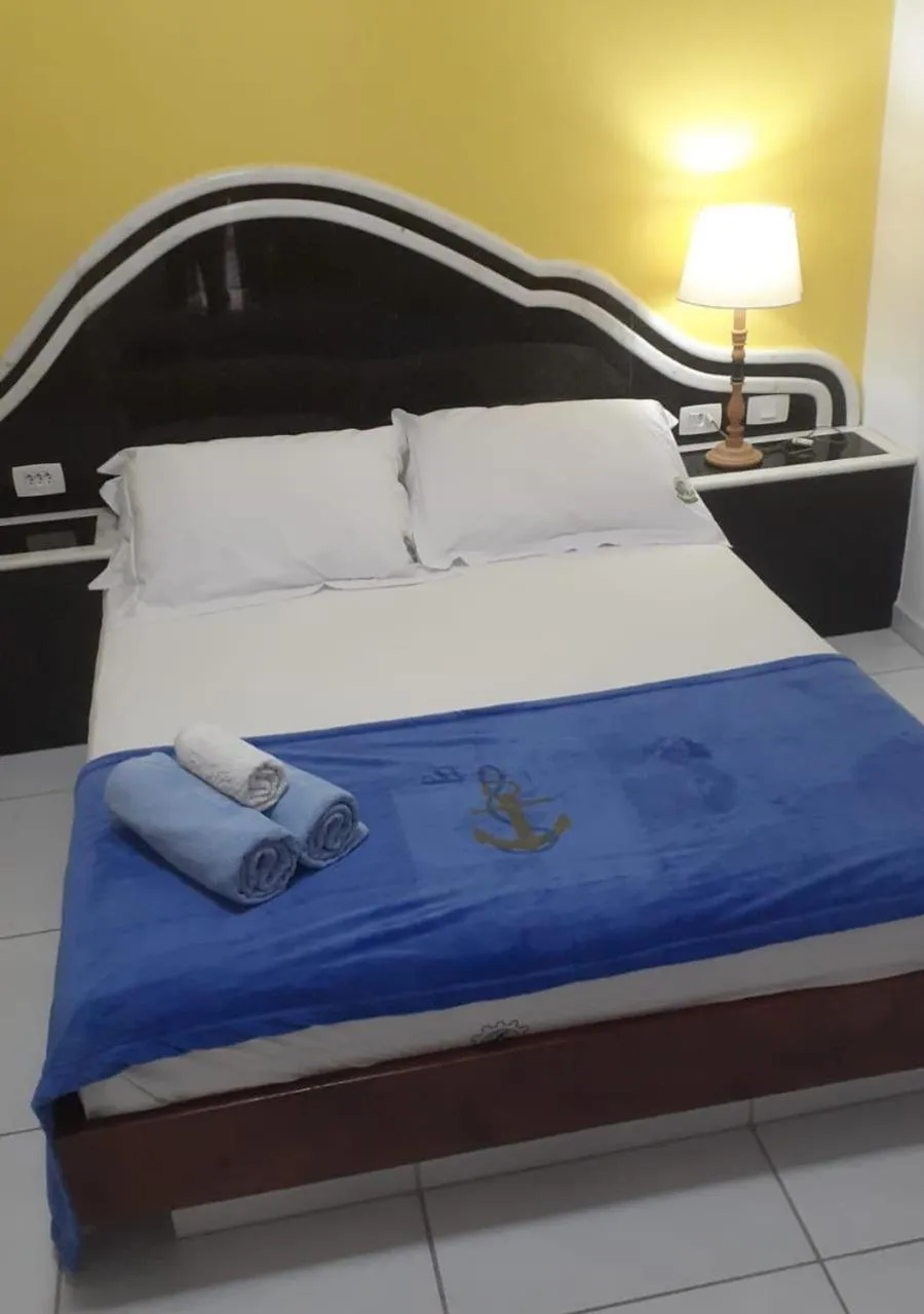 Bed in Ancora Peruibe Hotel