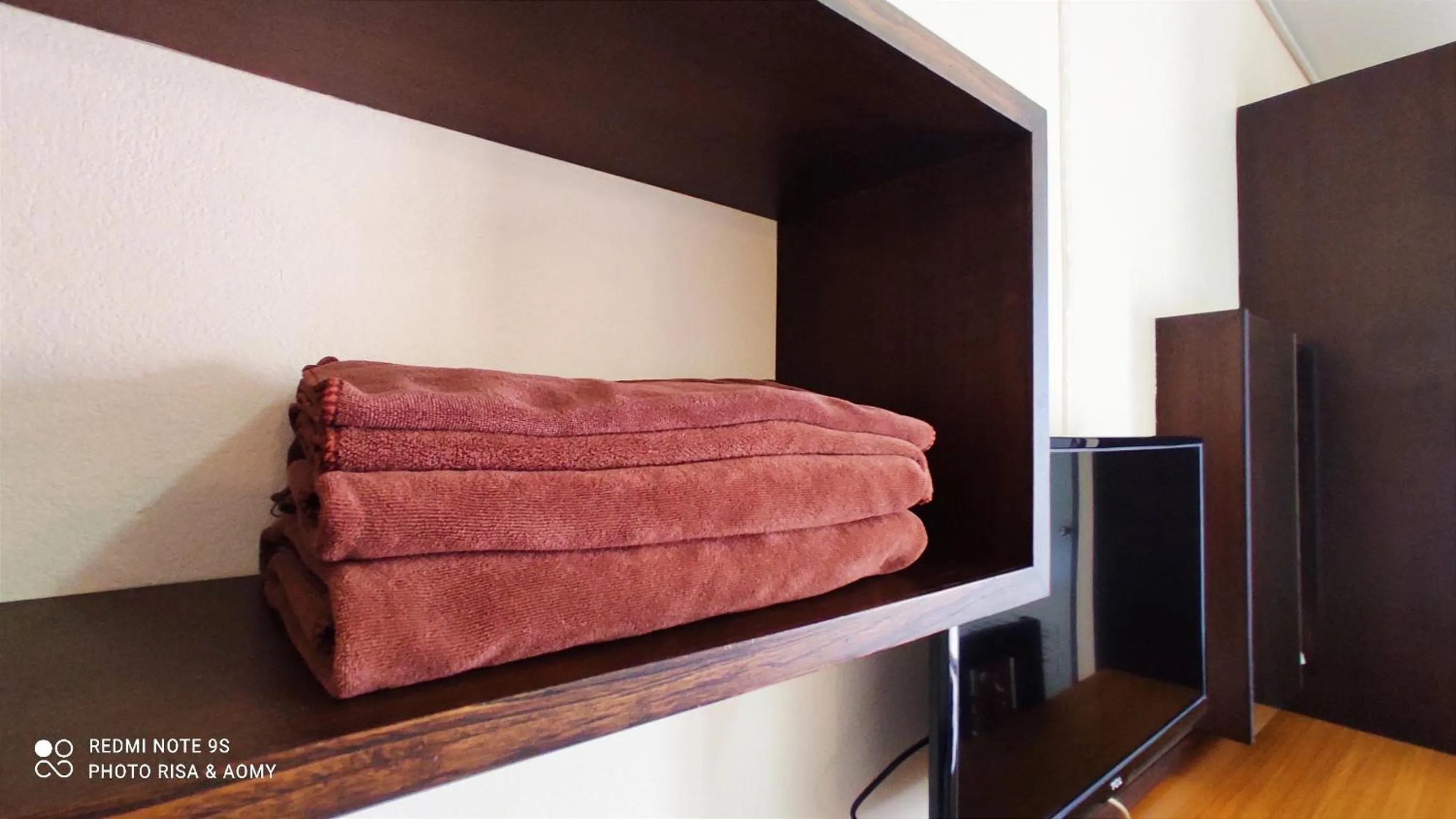 towels, Bed in 66 Apartment