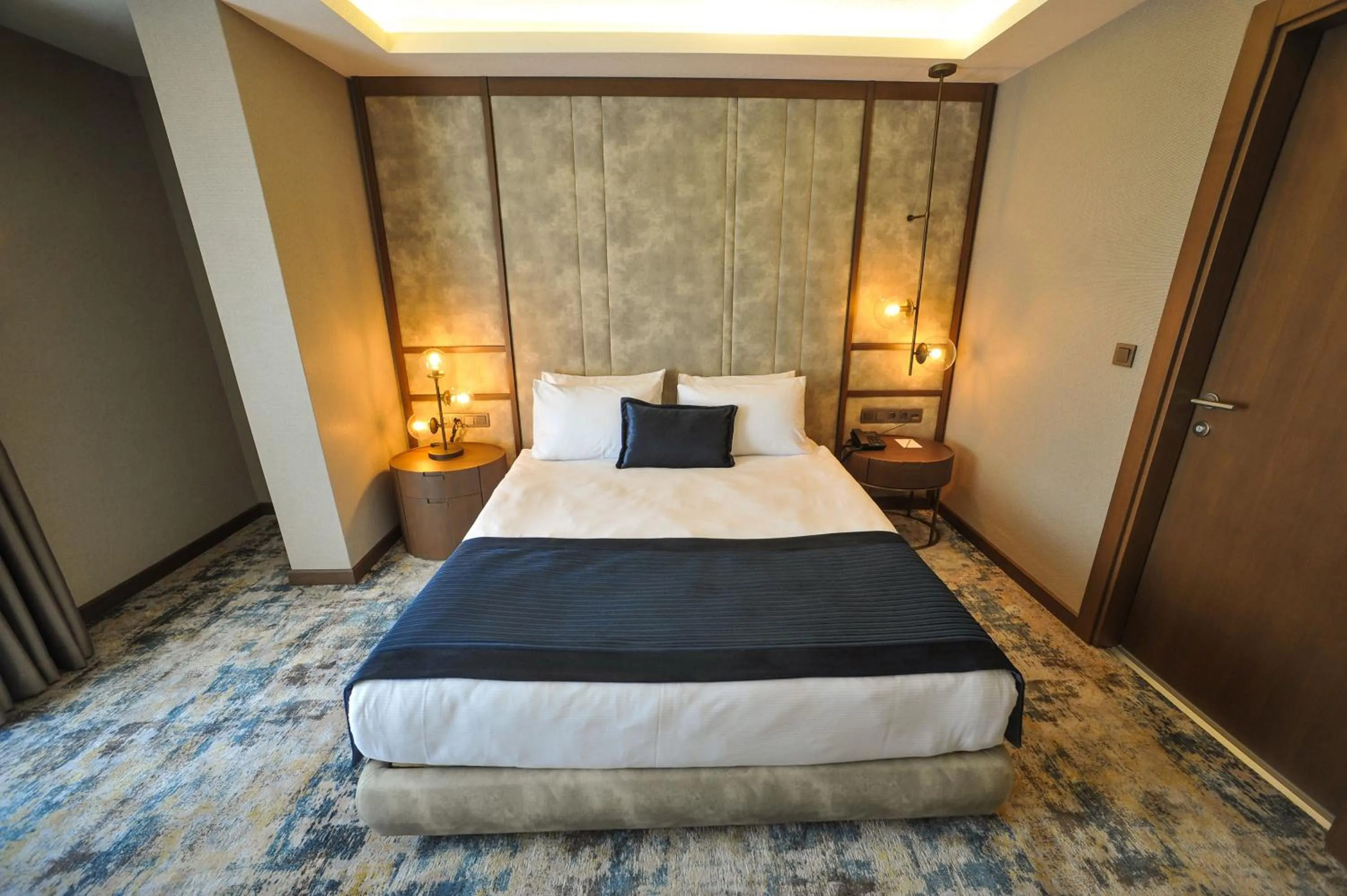 Bed in The Alpfine Hotel