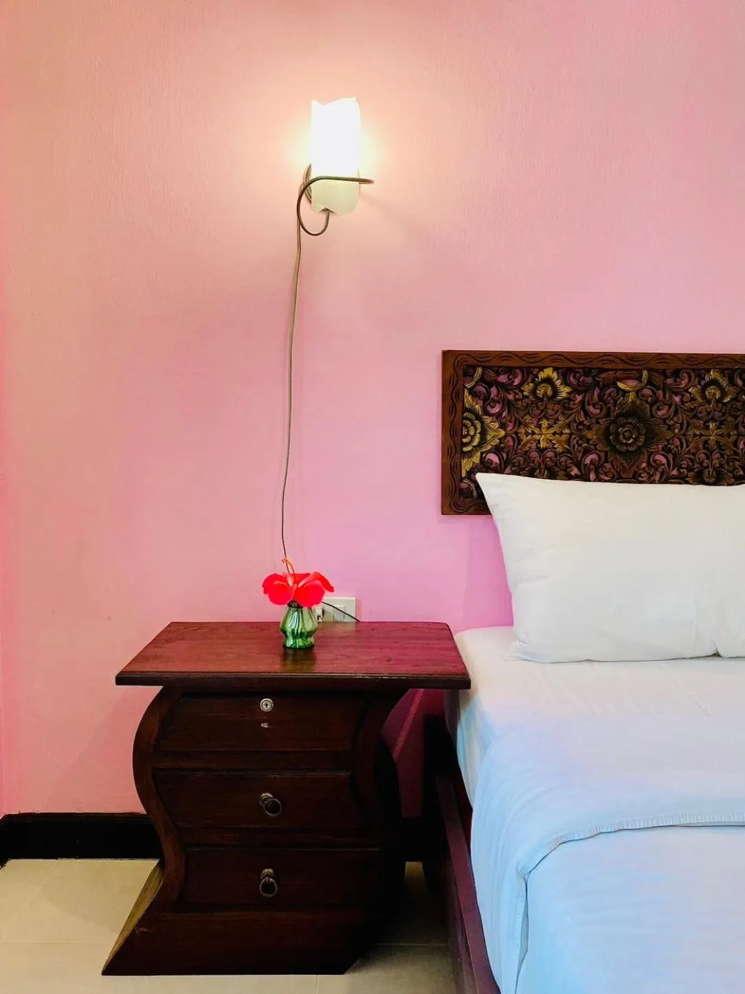 Bed in Baan Karnjana Hotel Samui