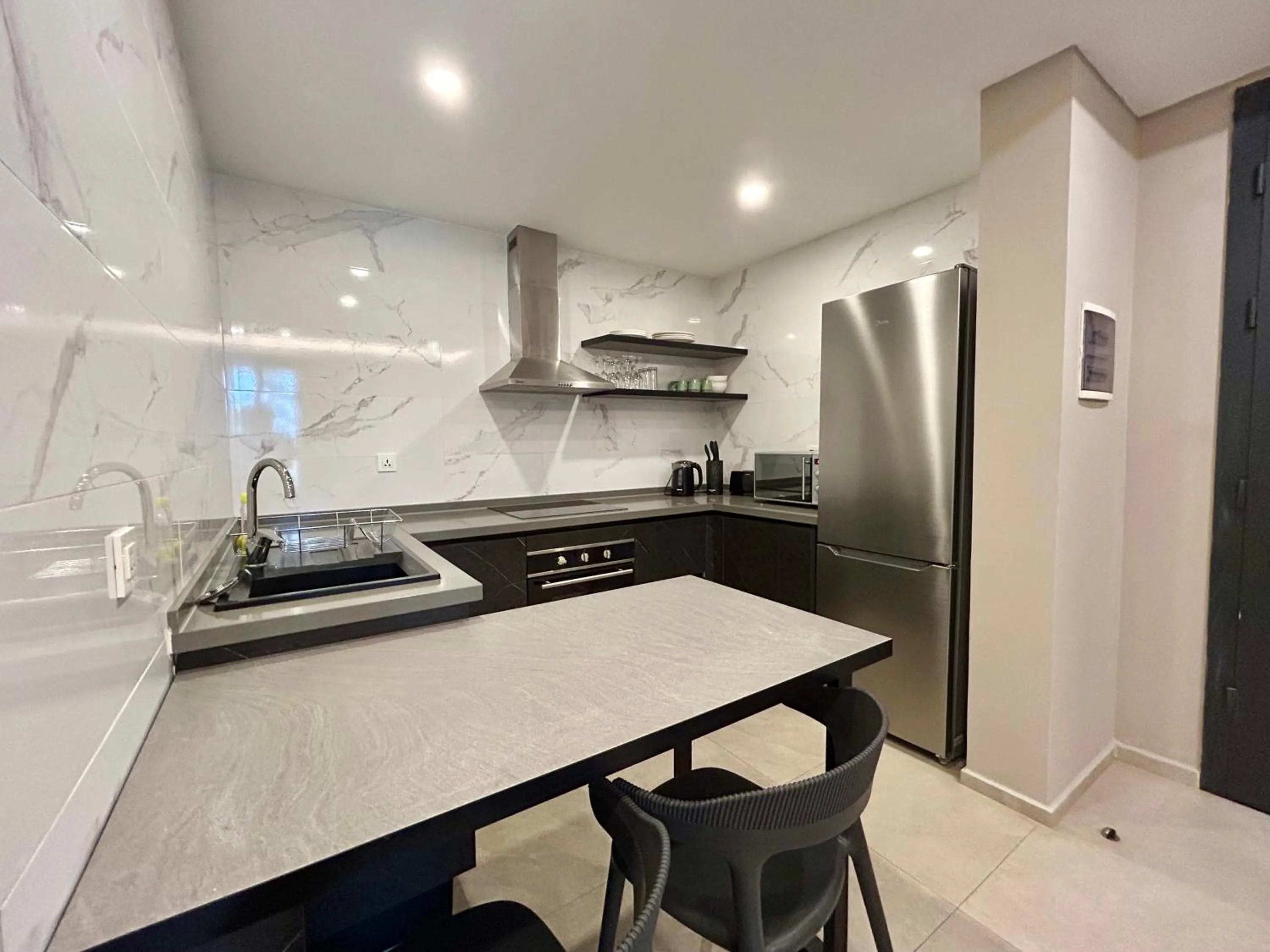 Kitchen or kitchenette in Kololi Sands Apartments