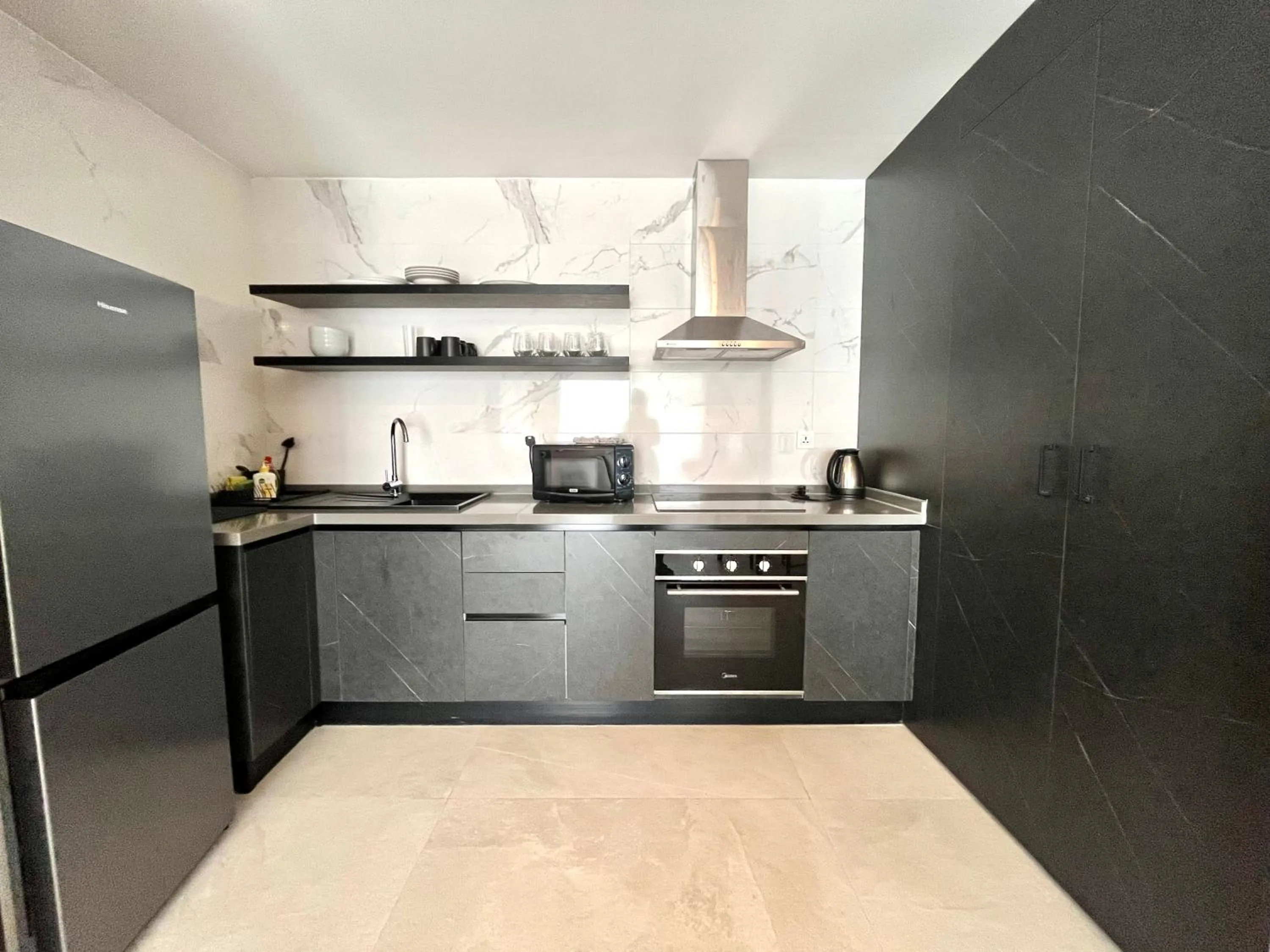 Kitchen or kitchenette in Kololi Sands Apartments