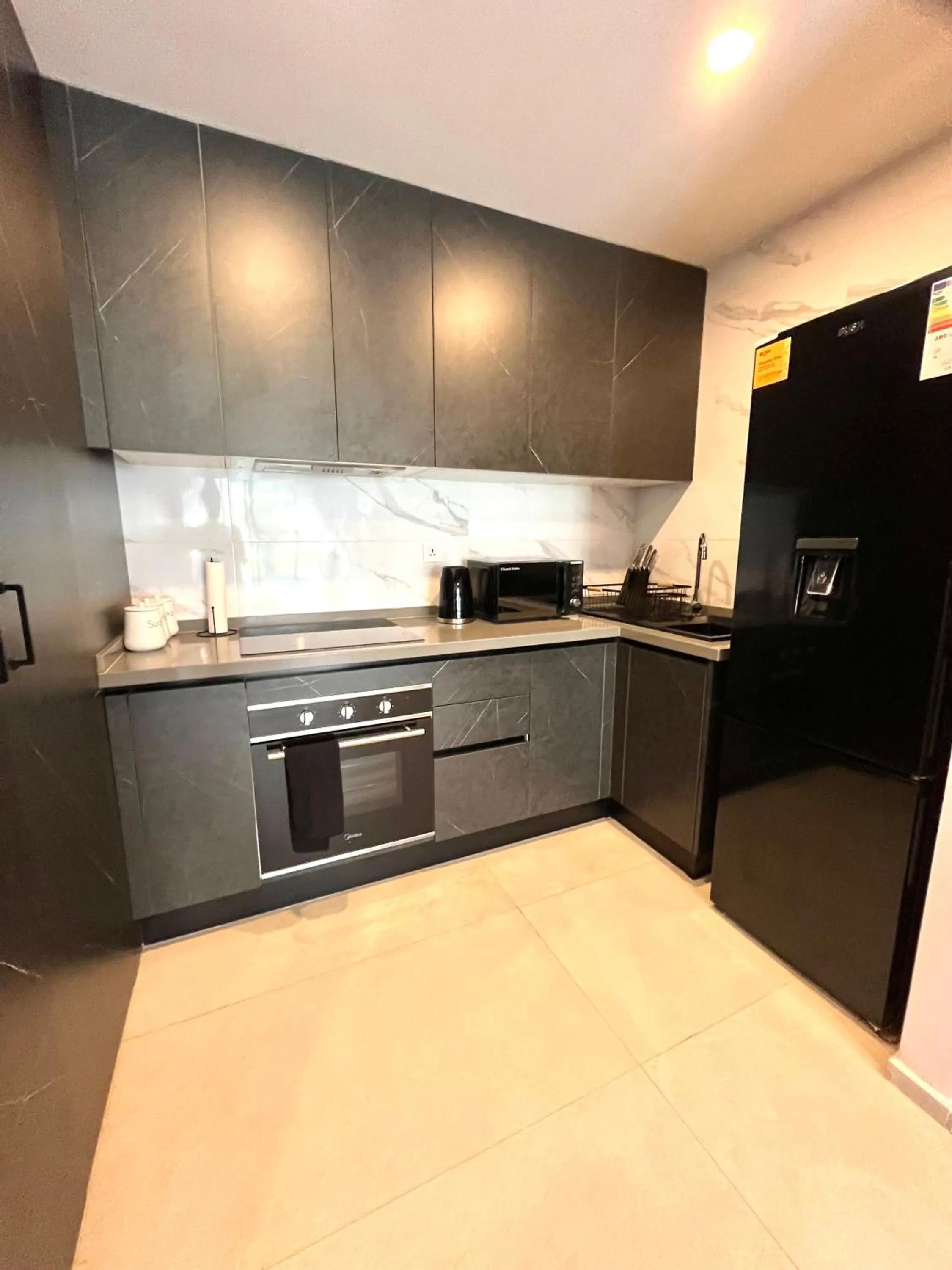 Kitchen or kitchenette in Kololi Sands Apartments