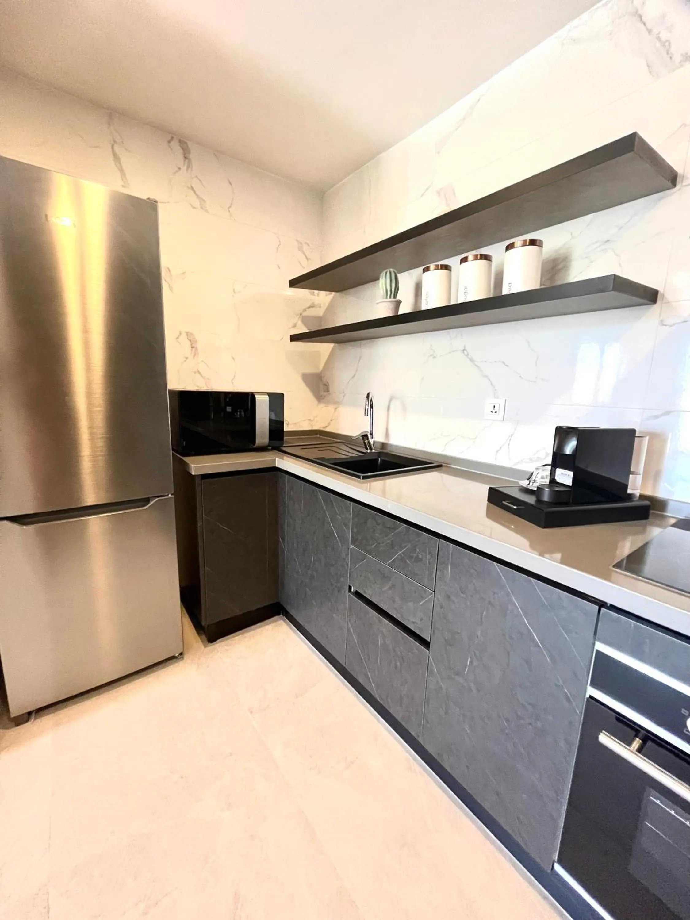 Kitchen or kitchenette in Kololi Sands Apartments