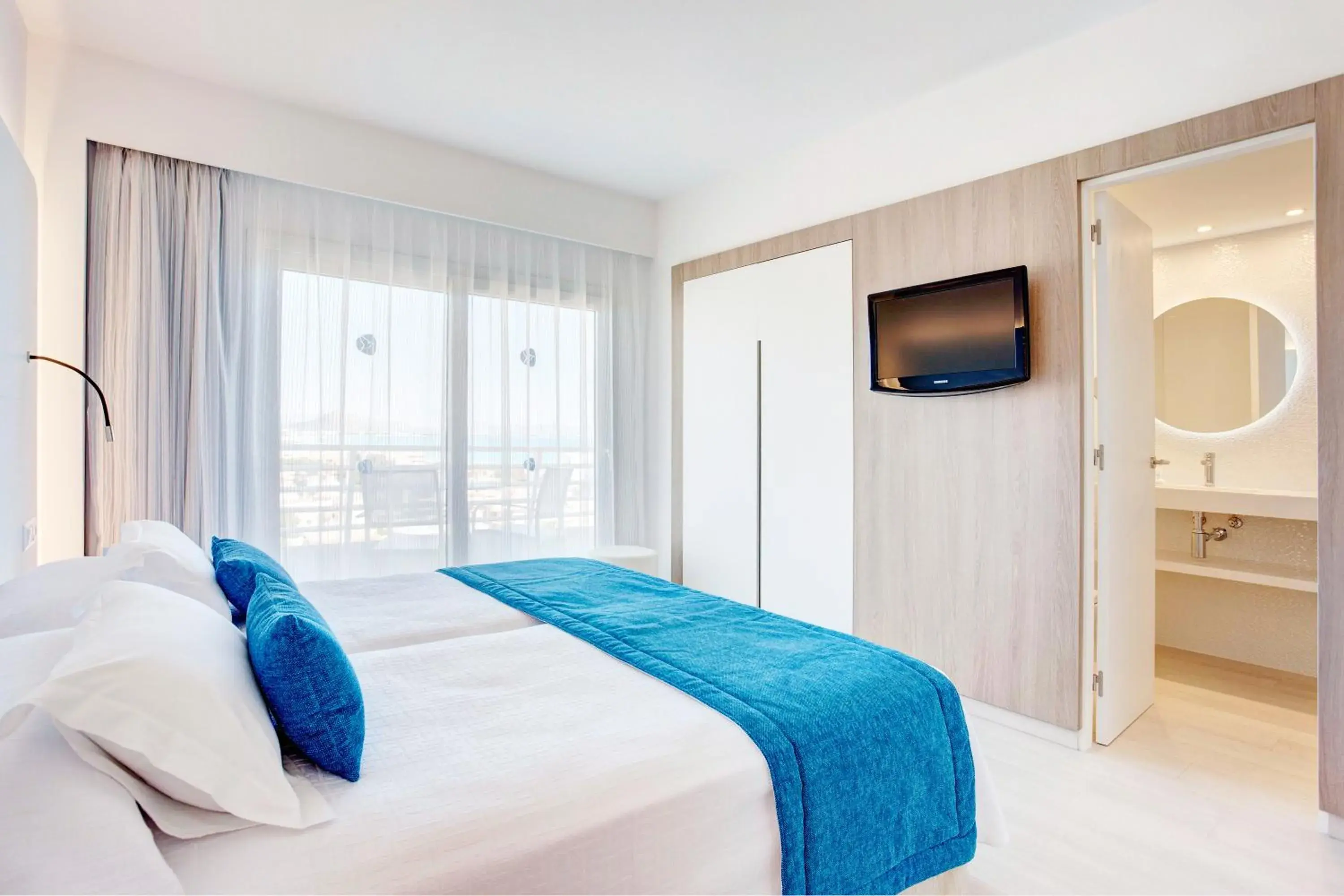 Twin Room with Side Sea View ( 2 Adults +1 Child) in Grupotel Farrutx Twin Room with Side Sea View ( 2 Adults +1 Child) in Grupotel Farrutx
