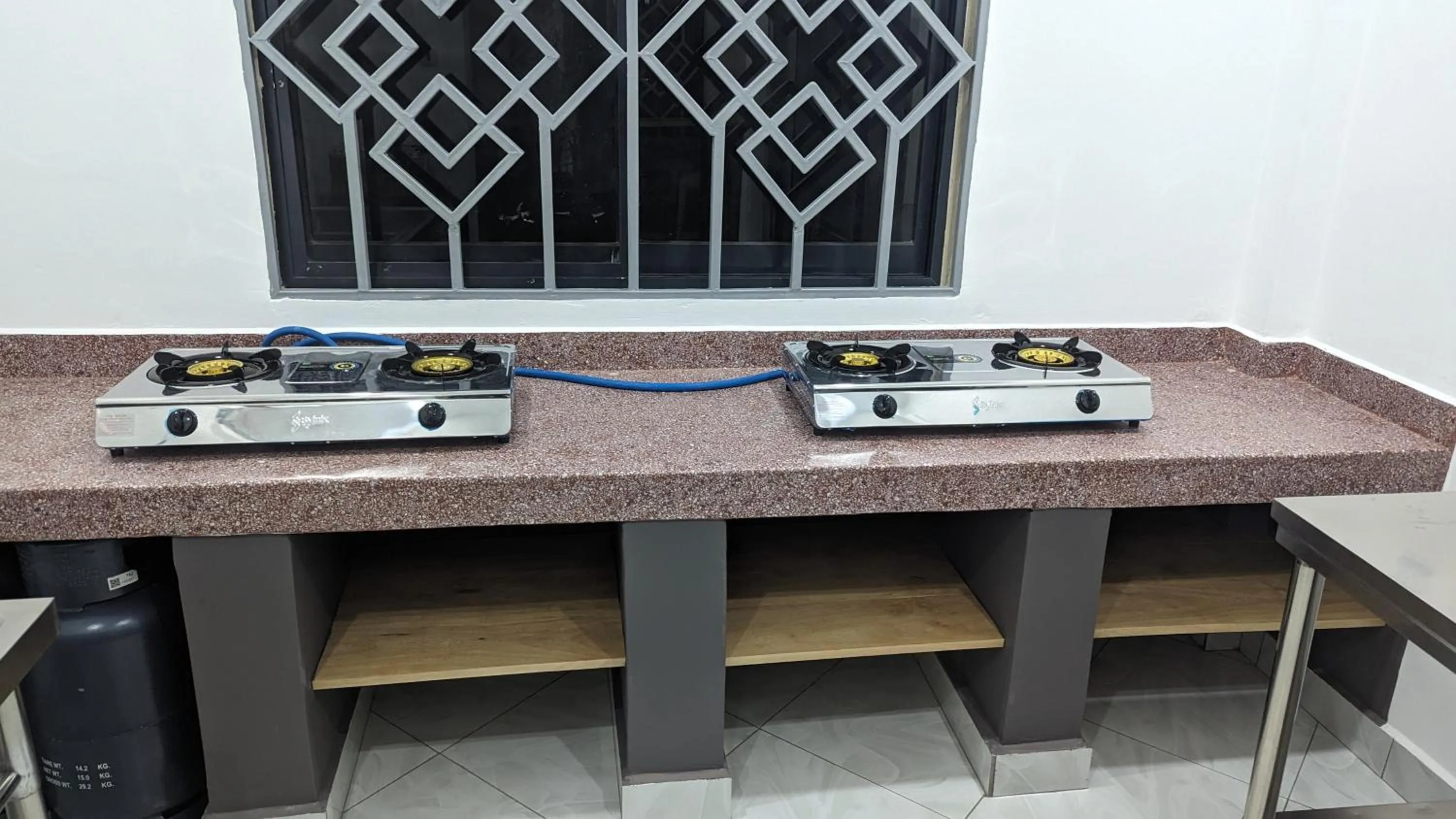 Kitchen or kitchenette in Mufasa city Hostel and Apartments