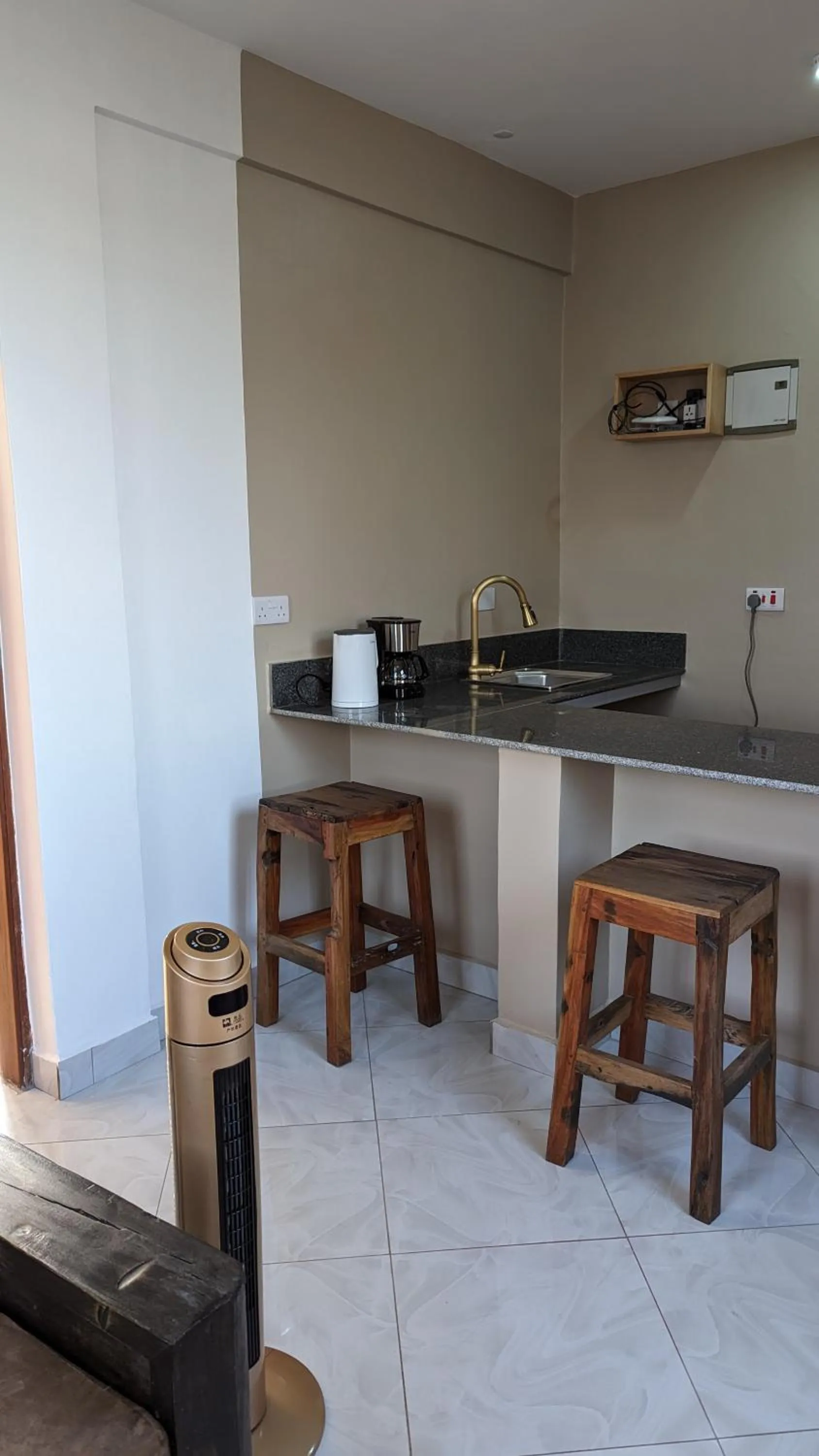 stove in Mufasa city Hostel and Apartments