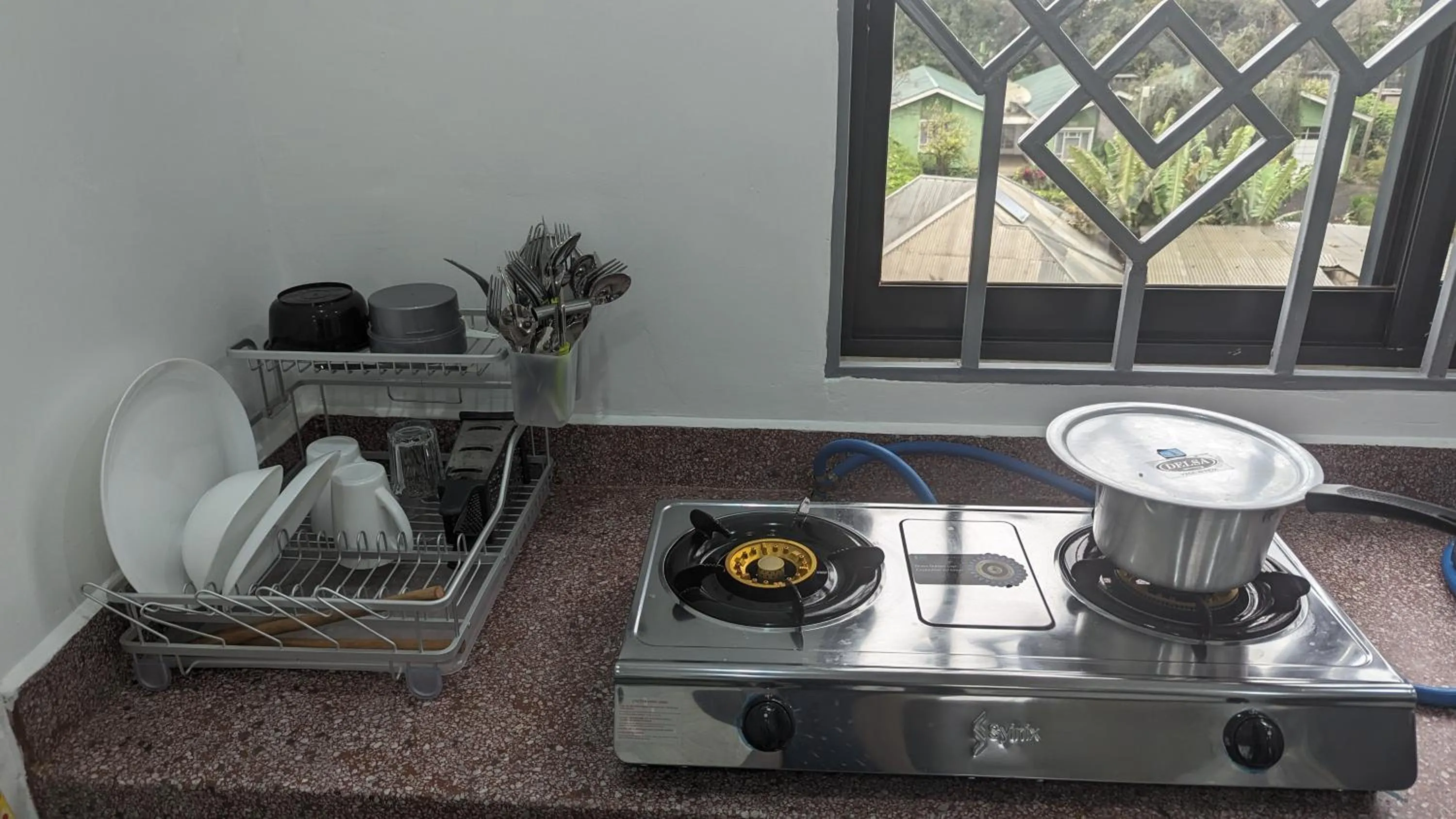 Kitchen or kitchenette in Mufasa city Hostel and Apartments