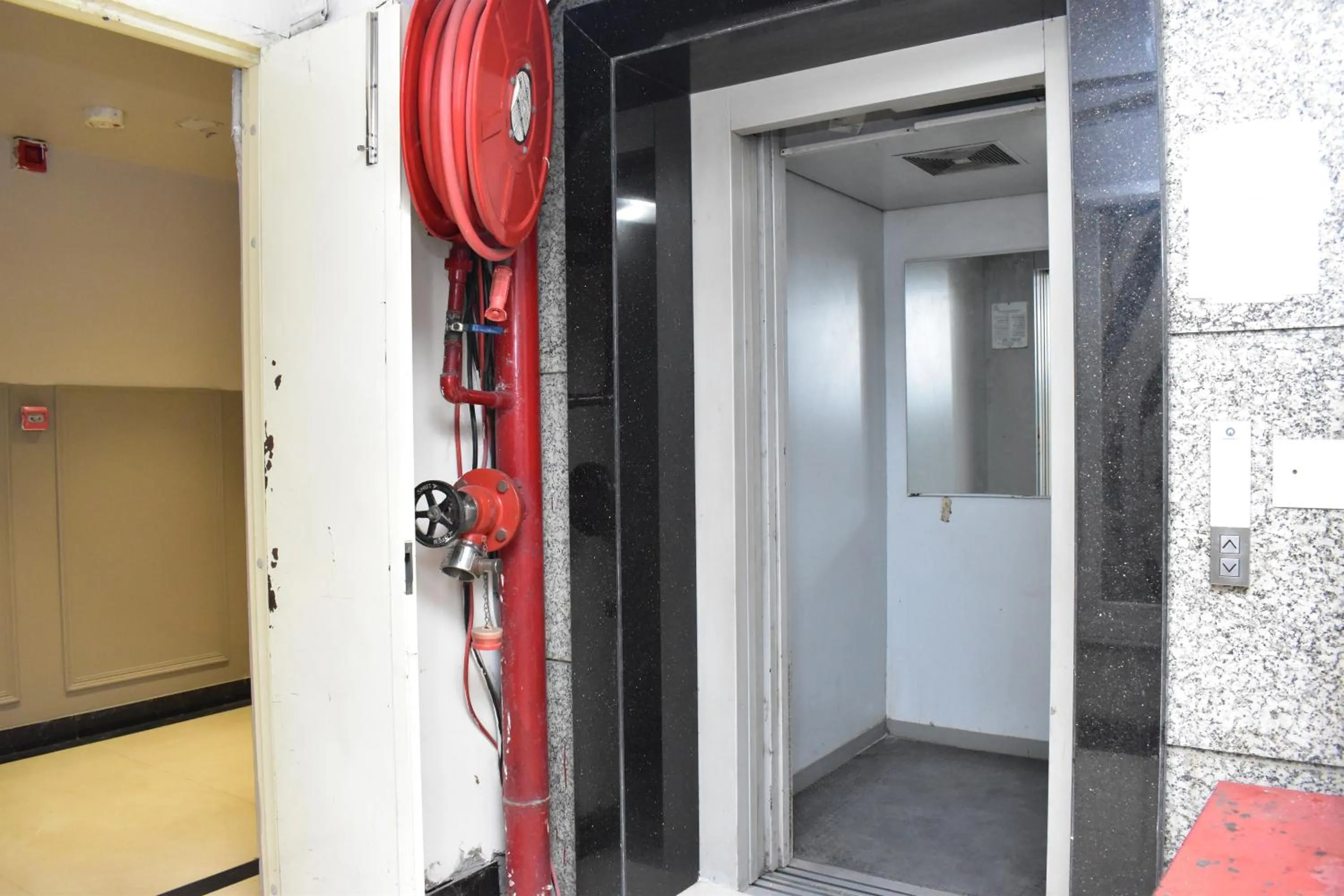 elevator in Qotel Comfort Golden Saffron Punjabi Bagh New Delhi