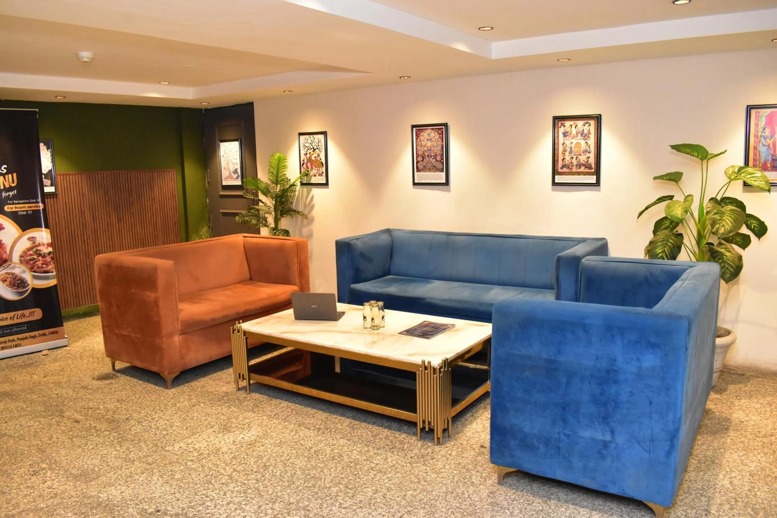 Living room in Qotel Comfort Golden Saffron Punjabi Bagh New Delhi
