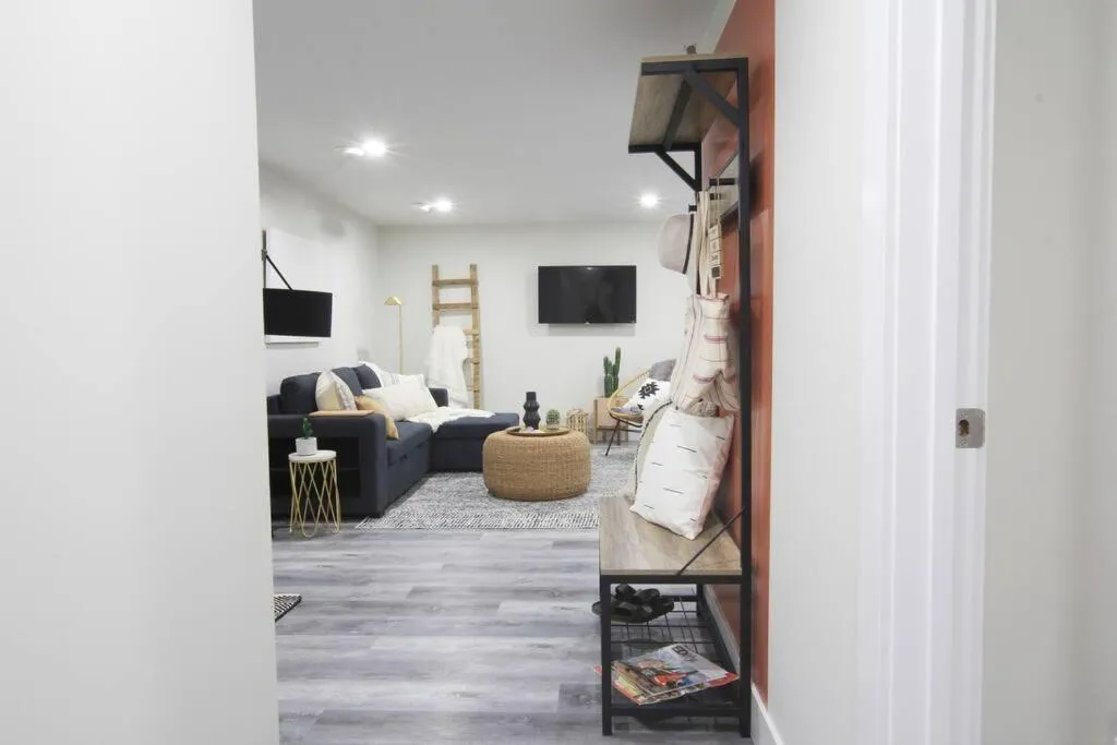 Living room in Executive Bsmt Suite, King Bed, 5 min to DT & Whyte Ave, Sleeps 6!