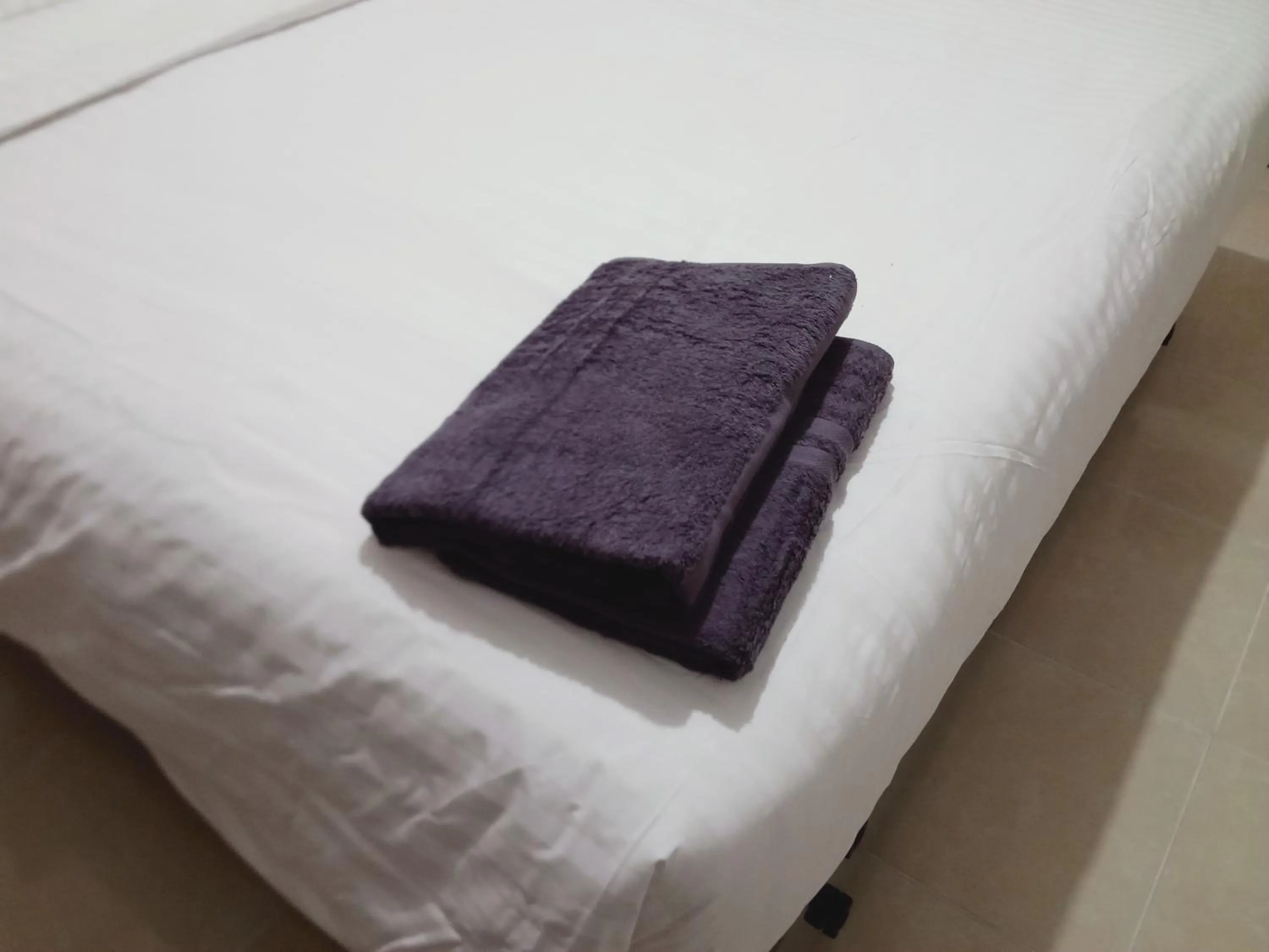 Bed in De Green Inn Serua